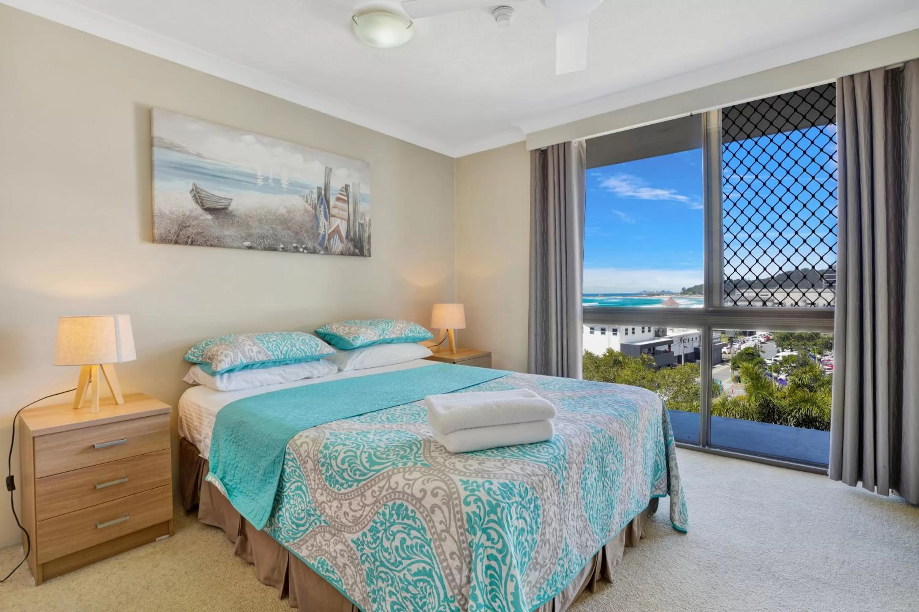 Bed in Beach Palms Holiday Apartments