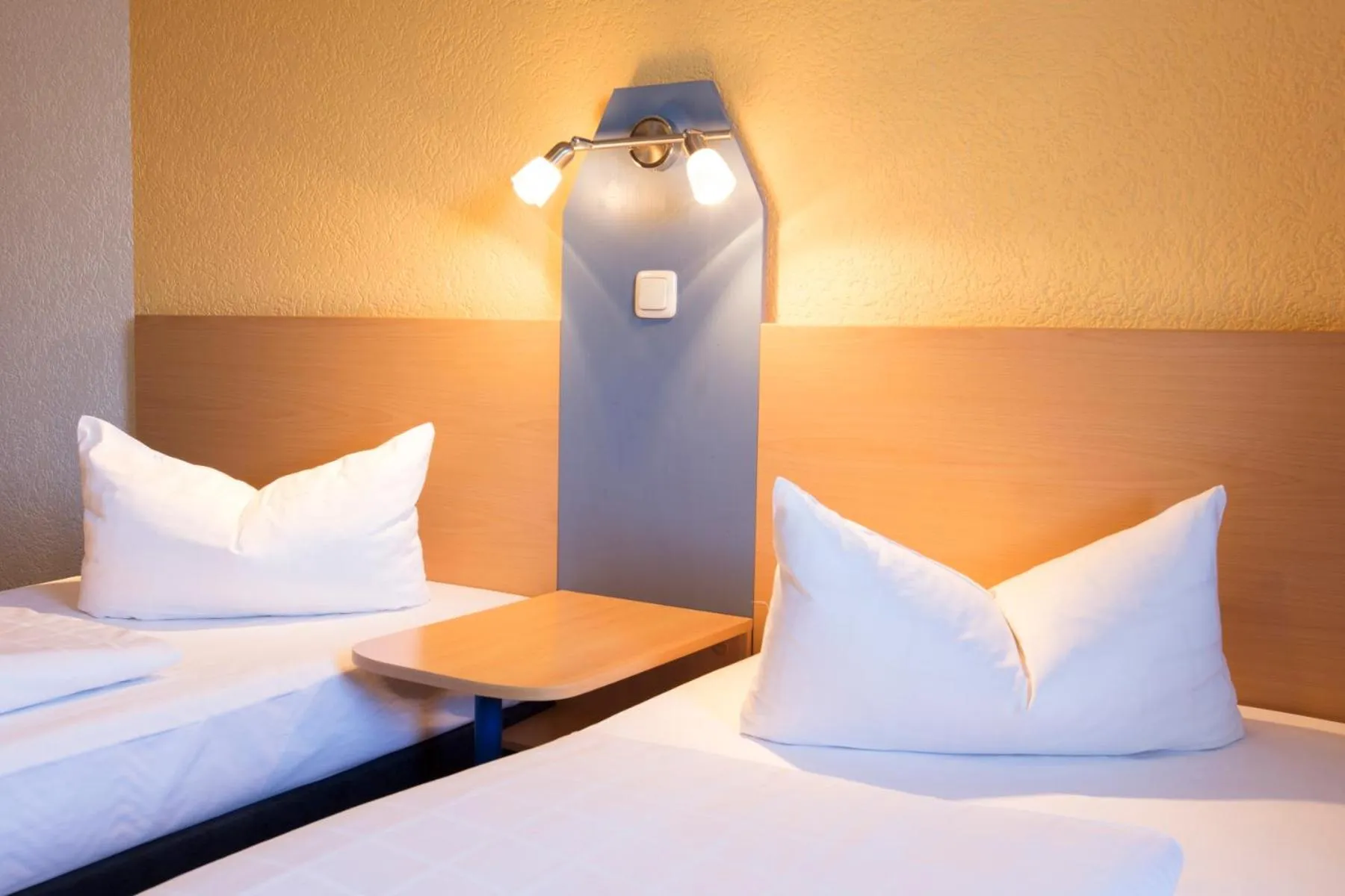 Bed in Akzenthaus Alpenrose Nesselwang