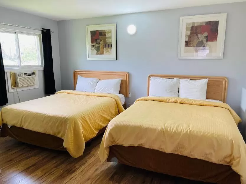 Family Suite with Three Queen Beds - Non-Smoking in A1 Inn