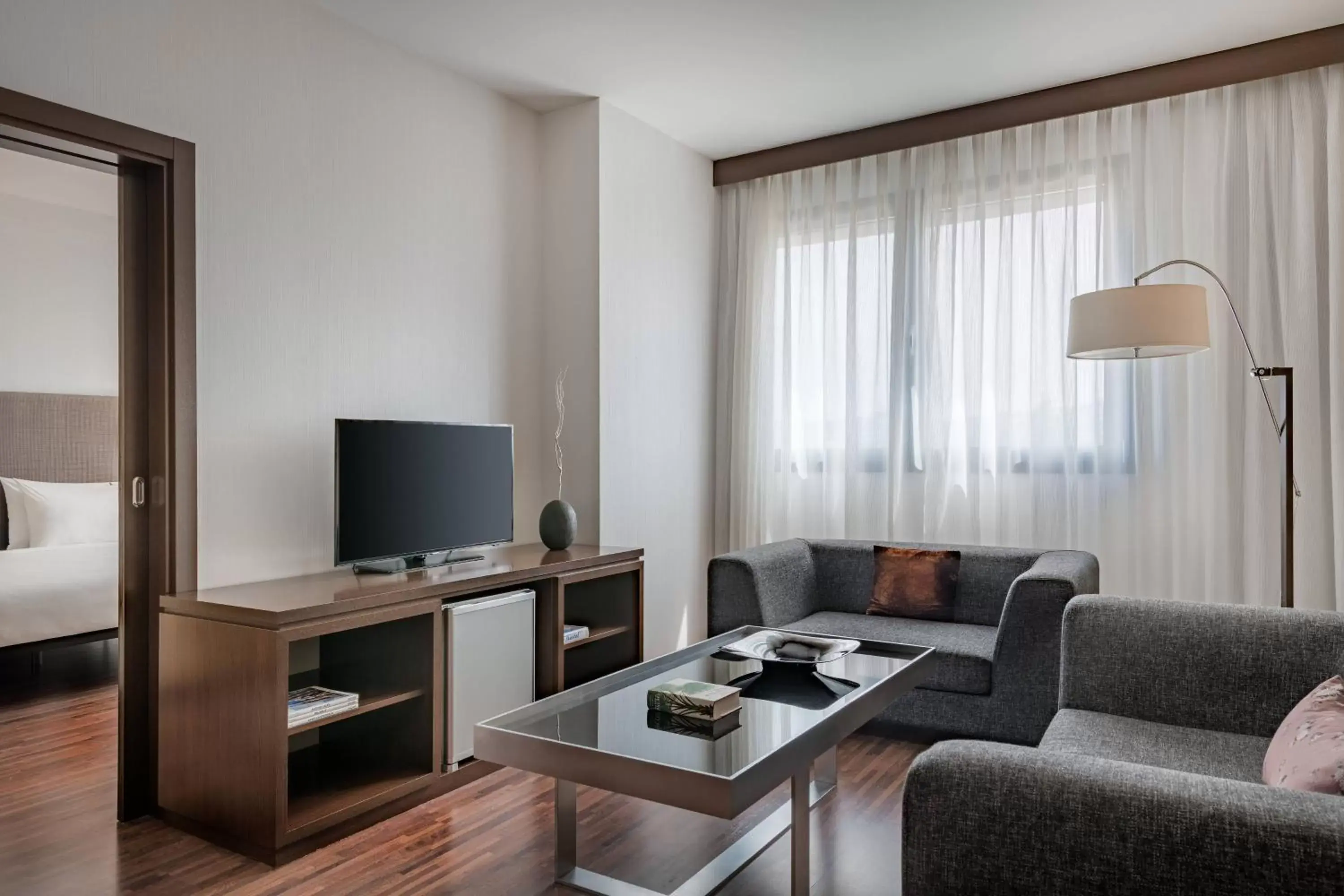 Photo of the whole room, TV/Entertainment Center in AC Hotel Bologna by Marriott