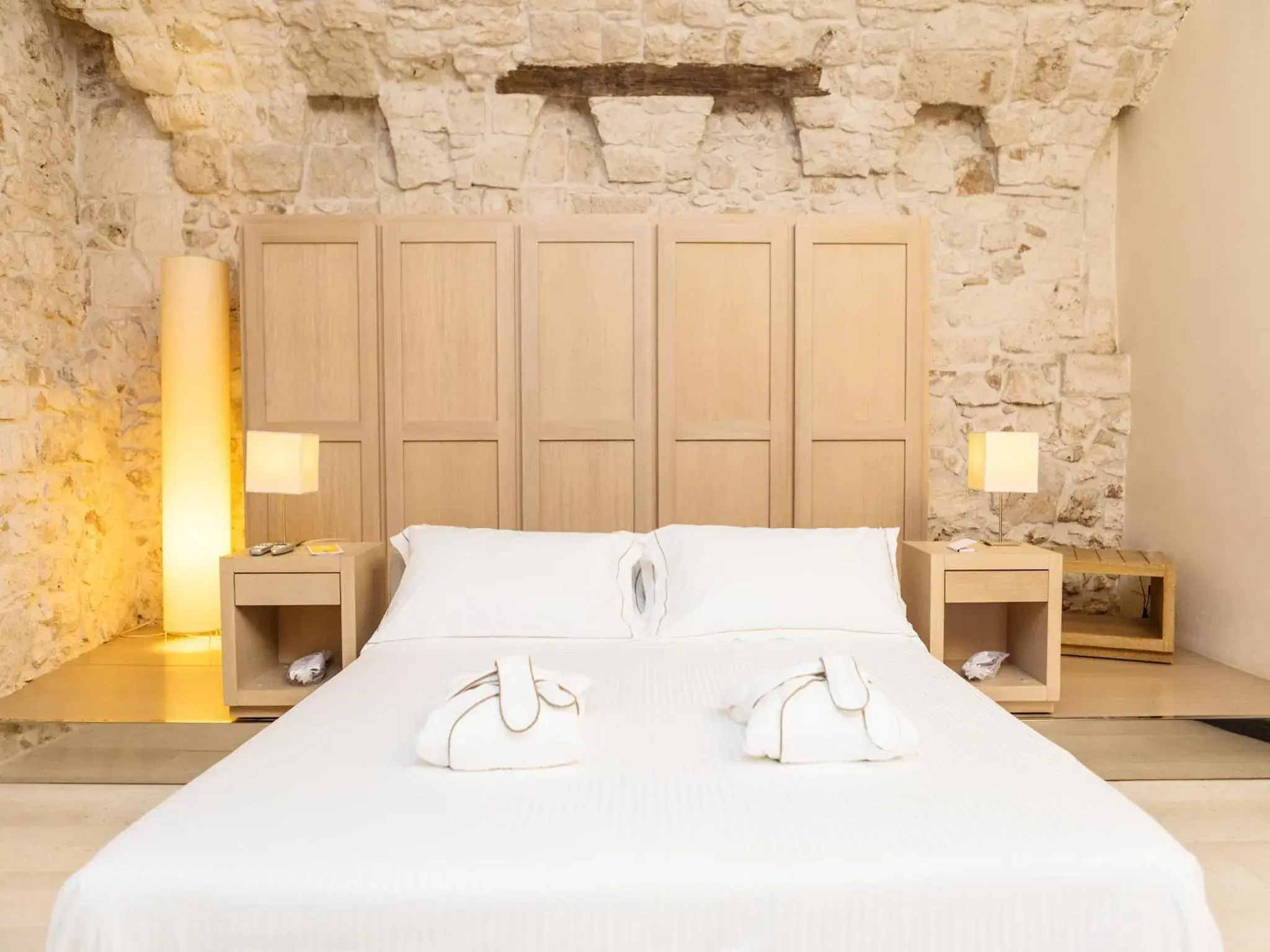 Bed in La Sommita Relais & Chateaux