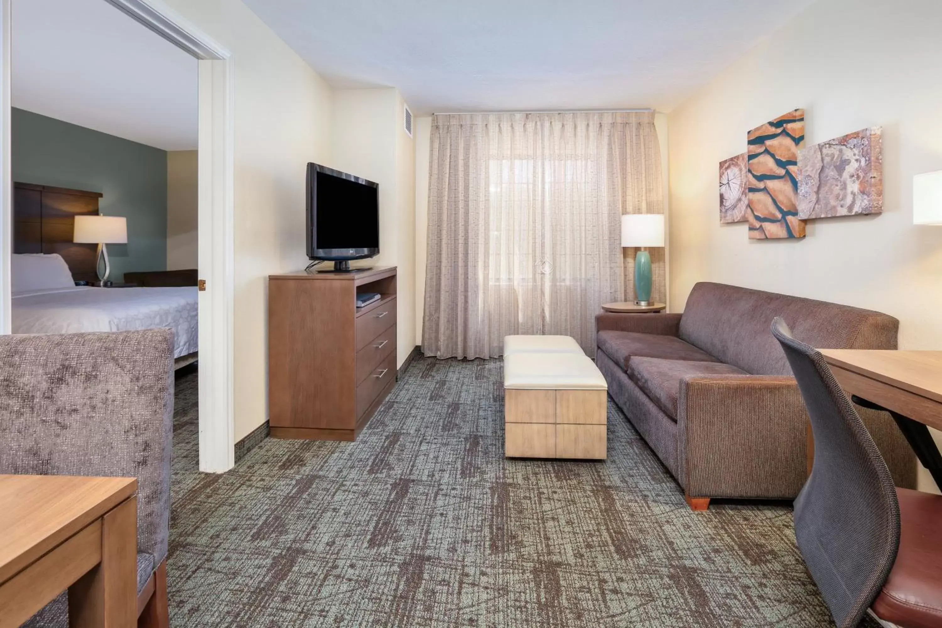 Photo of the whole room, Seating Area in Staybridge Suites Corning, an IHG Hotel