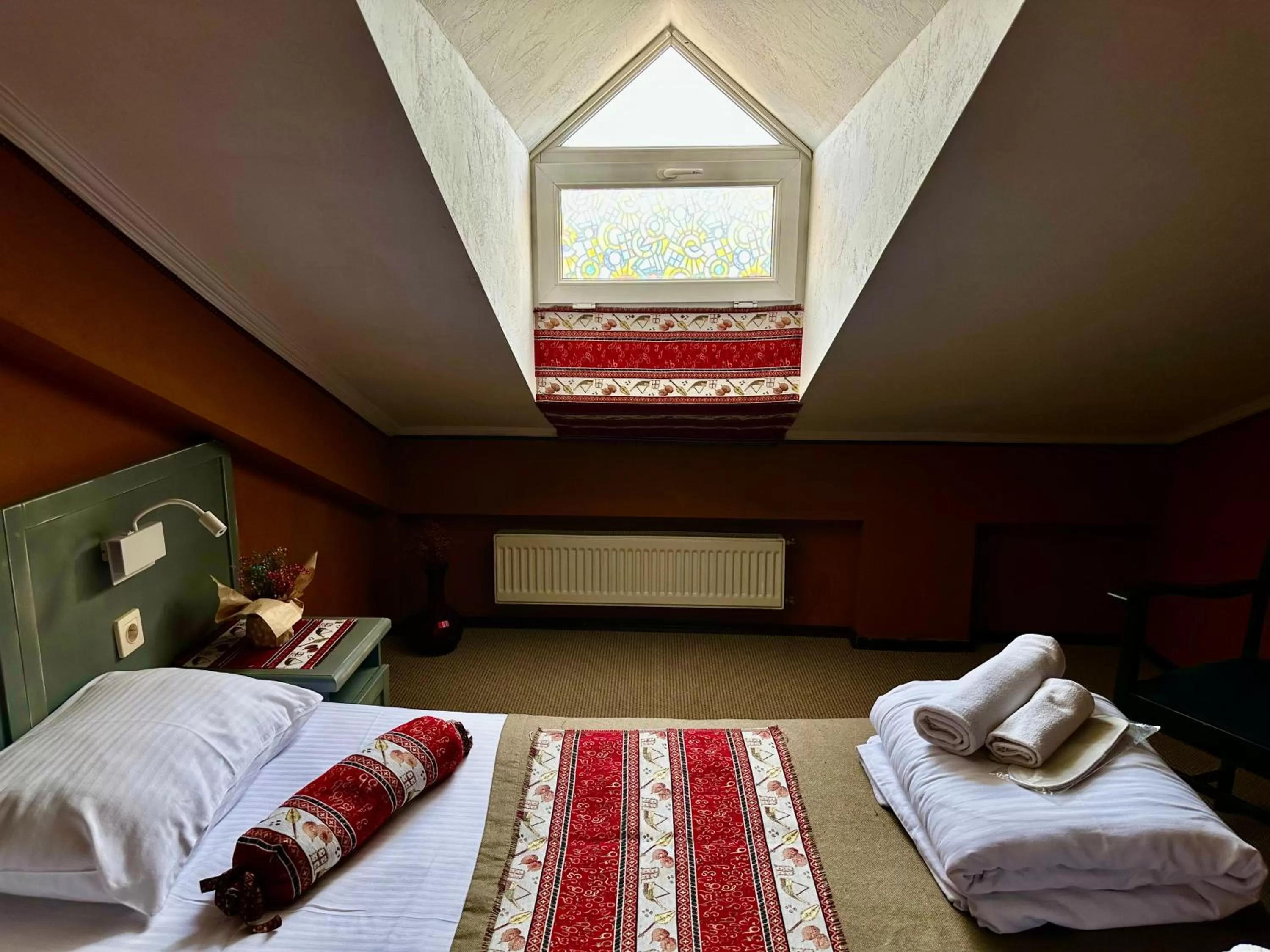 Bed in Kindli Boutique Hotel