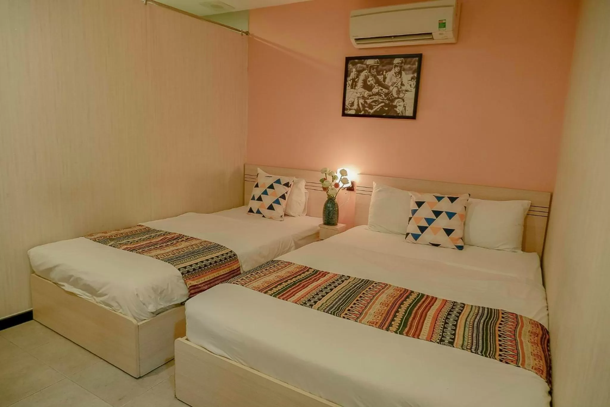 Bed in Galaxy Boutique Sai Gon Central Hotel