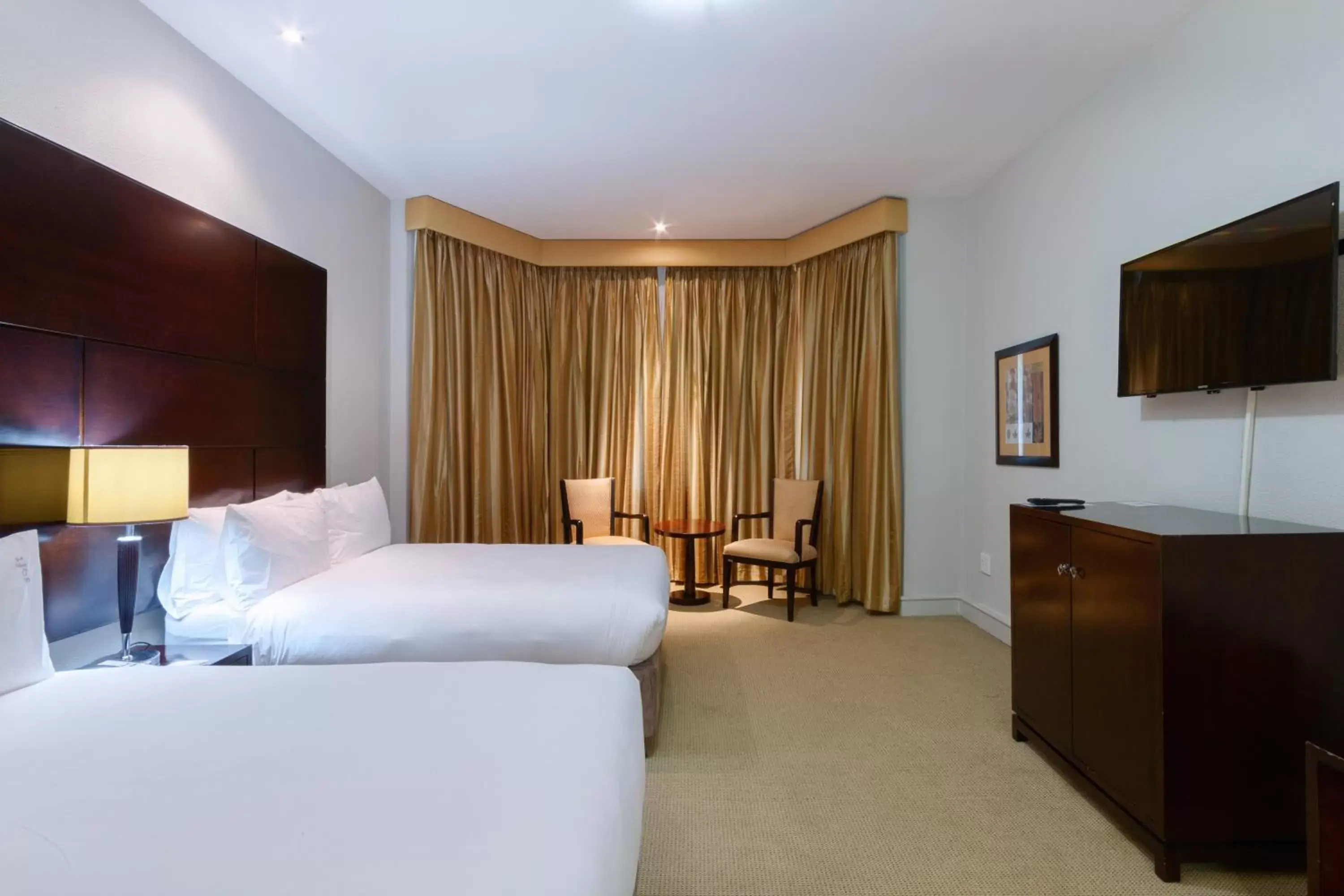 Photo of the whole room, TV/Entertainment Center in Holiday Inn - Johannesburg Sunnyside Park, an IHG Hotel