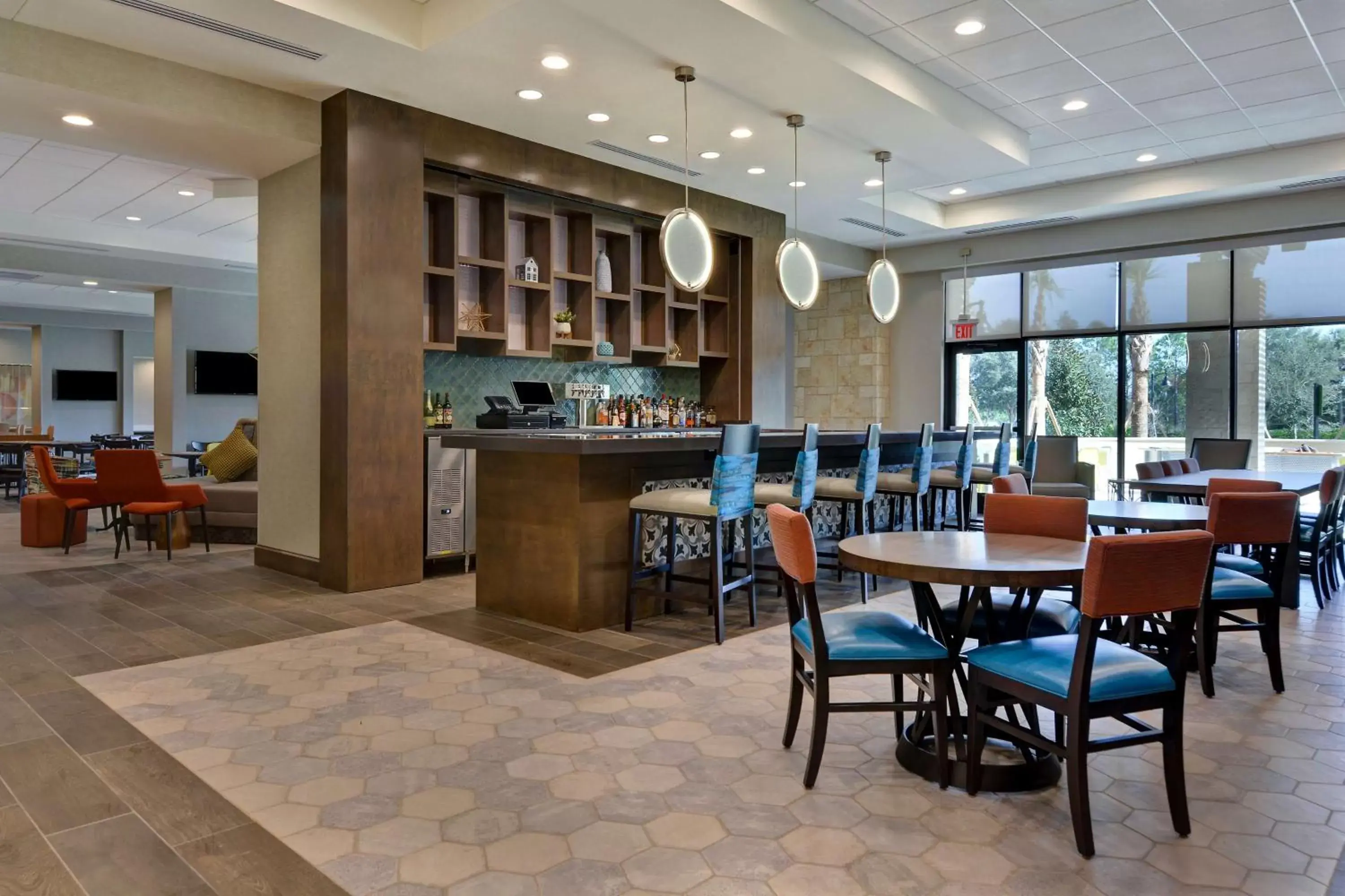 Lobby or reception, Restaurant/Places to Eat in Home2 Suites By Hilton Orlando Flamingo Crossings, FL