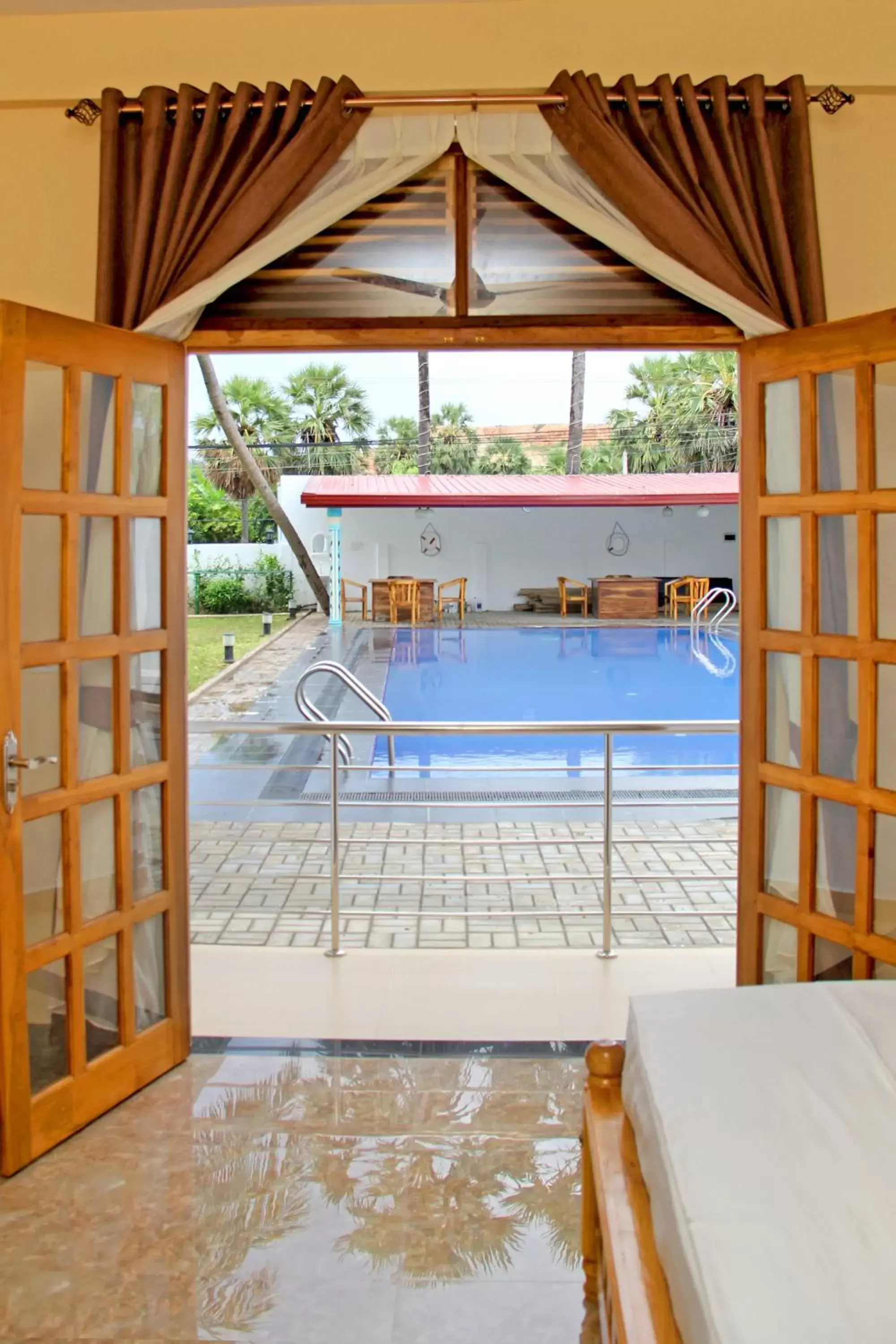 Deluxe Double Room with Pool View - Ground Floor in Bluewater Beach Resort Deluxe Double Room with Pool View - Ground Floor in Bluewater Beach Resort