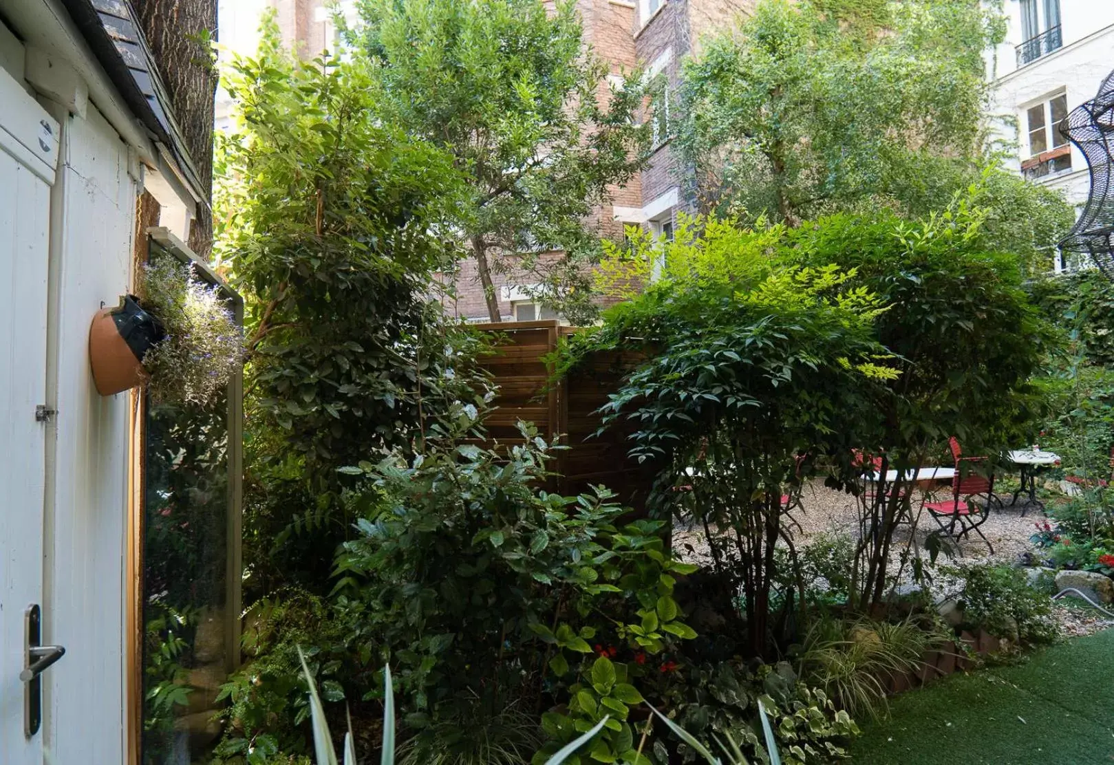 View (from property/room), Garden in Hôtel de l'Avre