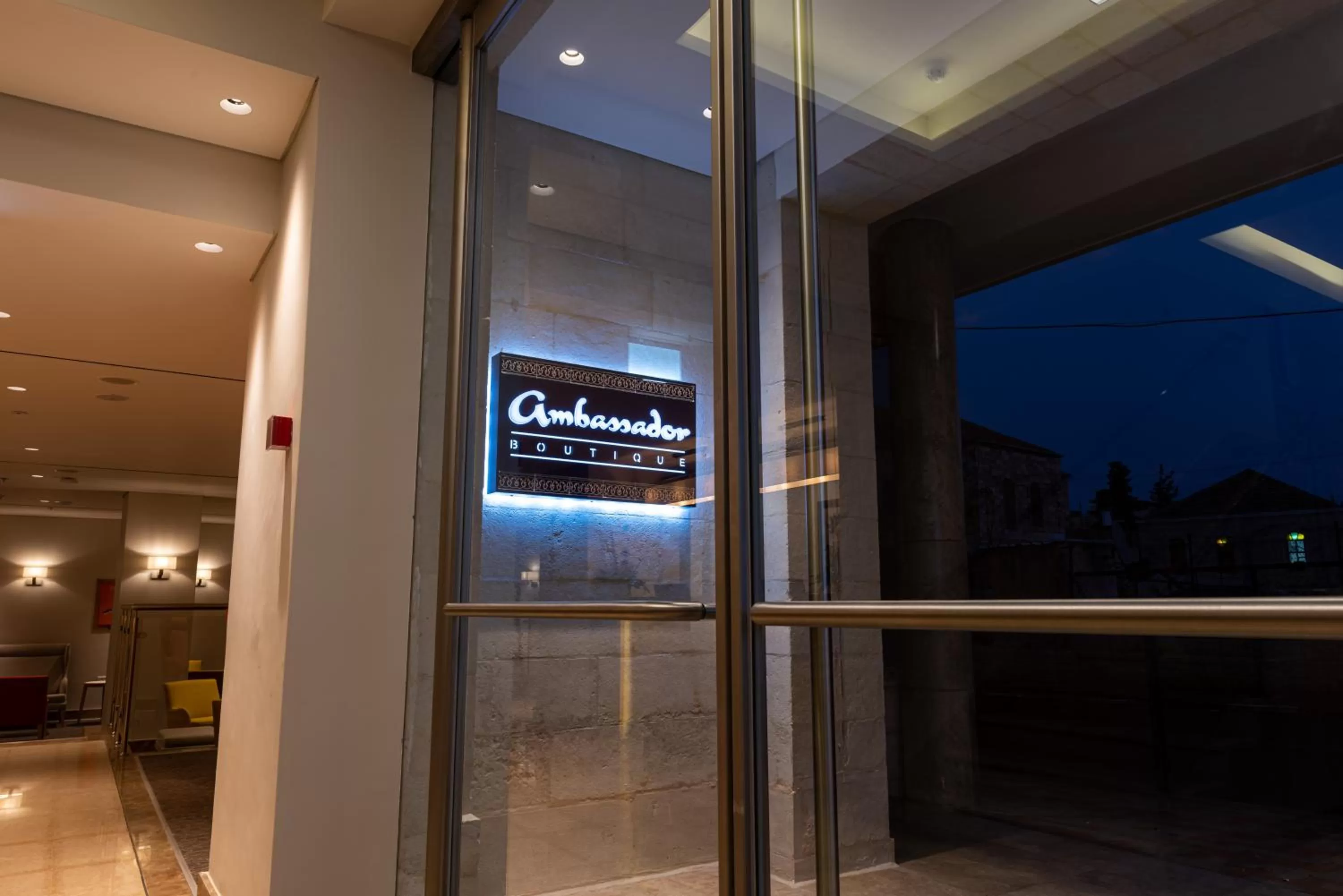 Property logo or sign in Ambassador Boutique Hotel