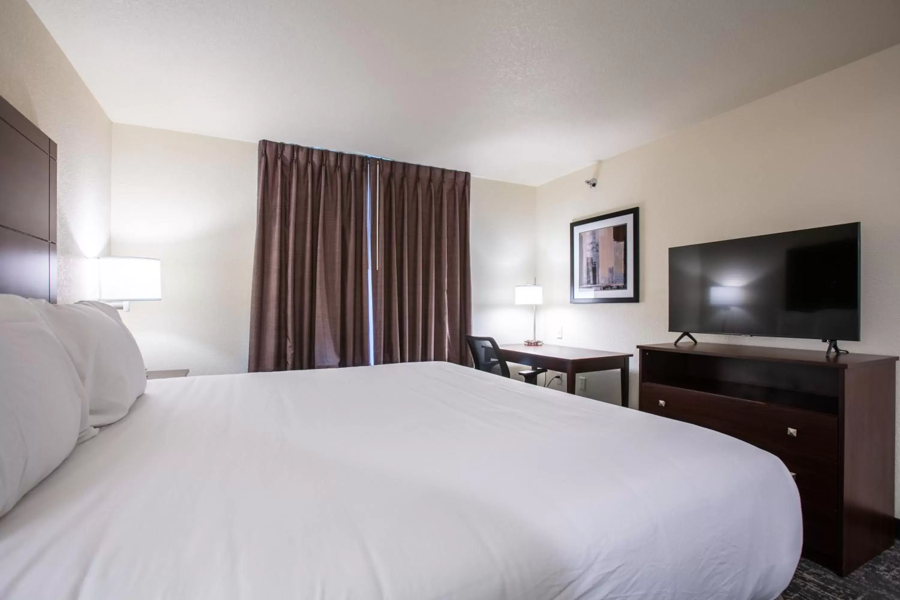 Bed in Cobblestone Inn & Suites - Pine Bluffs
