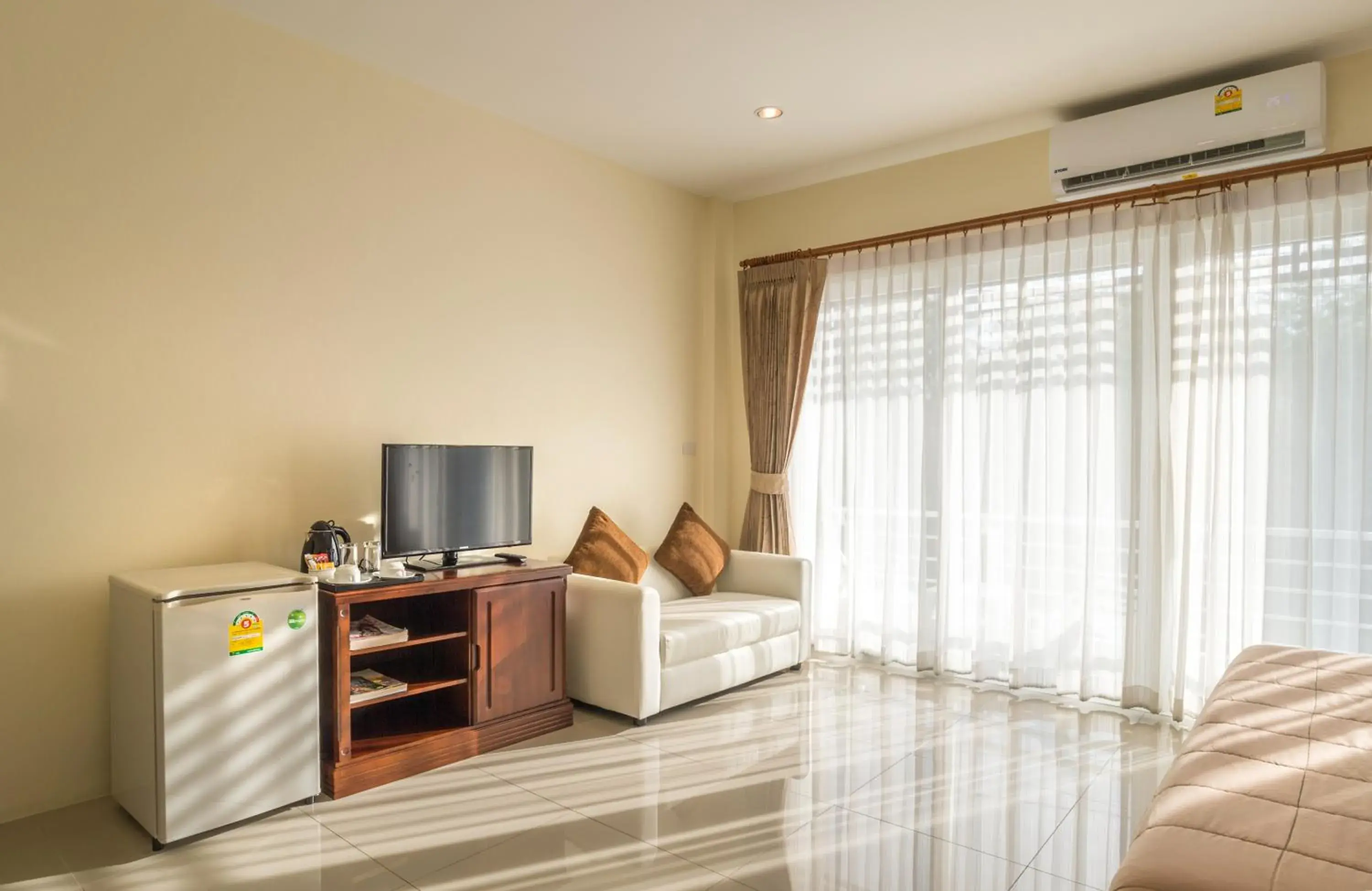 Communal lounge/ TV room, TV/Entertainment Center in Alisa Krabi Hotel-SHA Plus