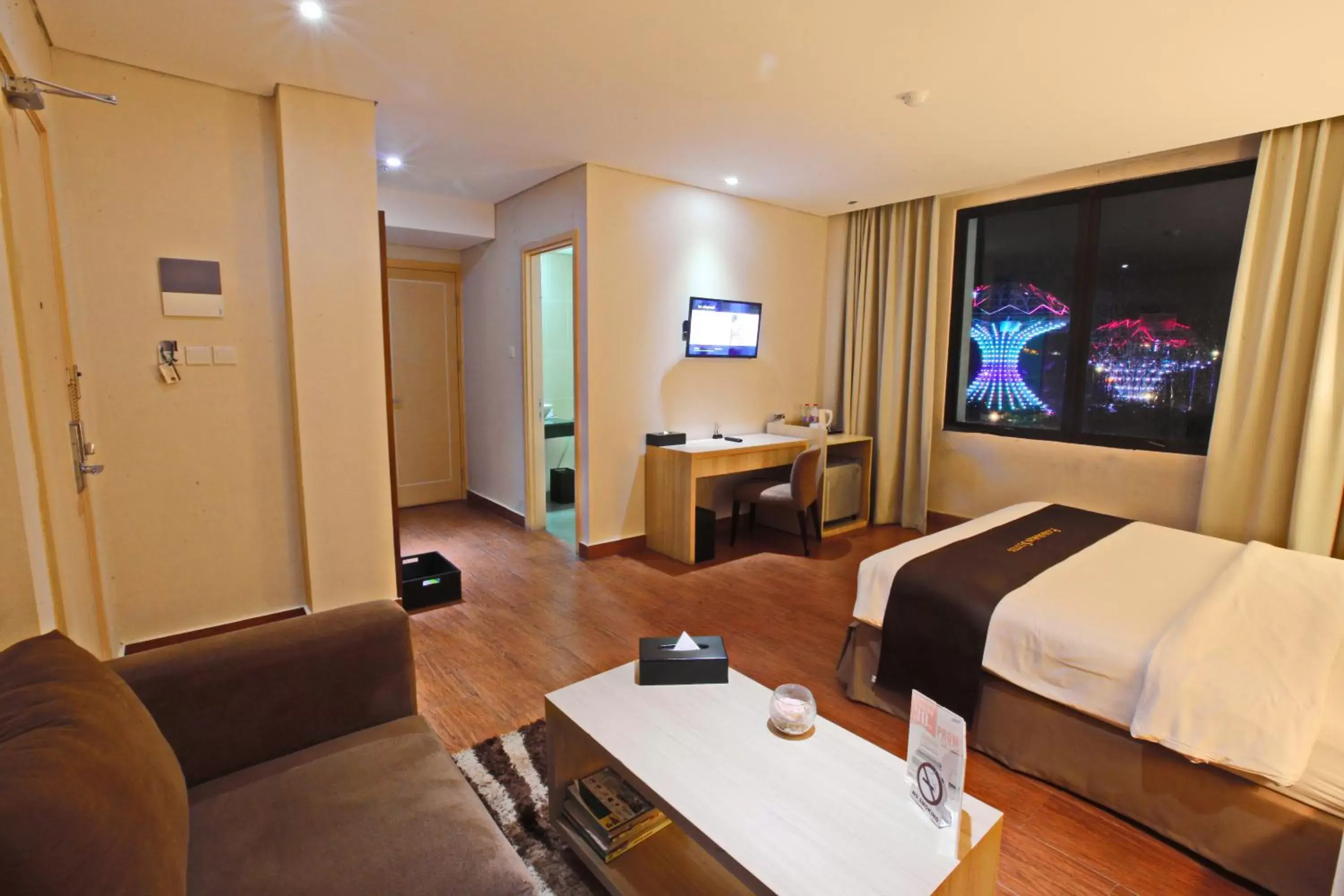 Bed in Padjadjaran Suites Resort and Convention Hotel