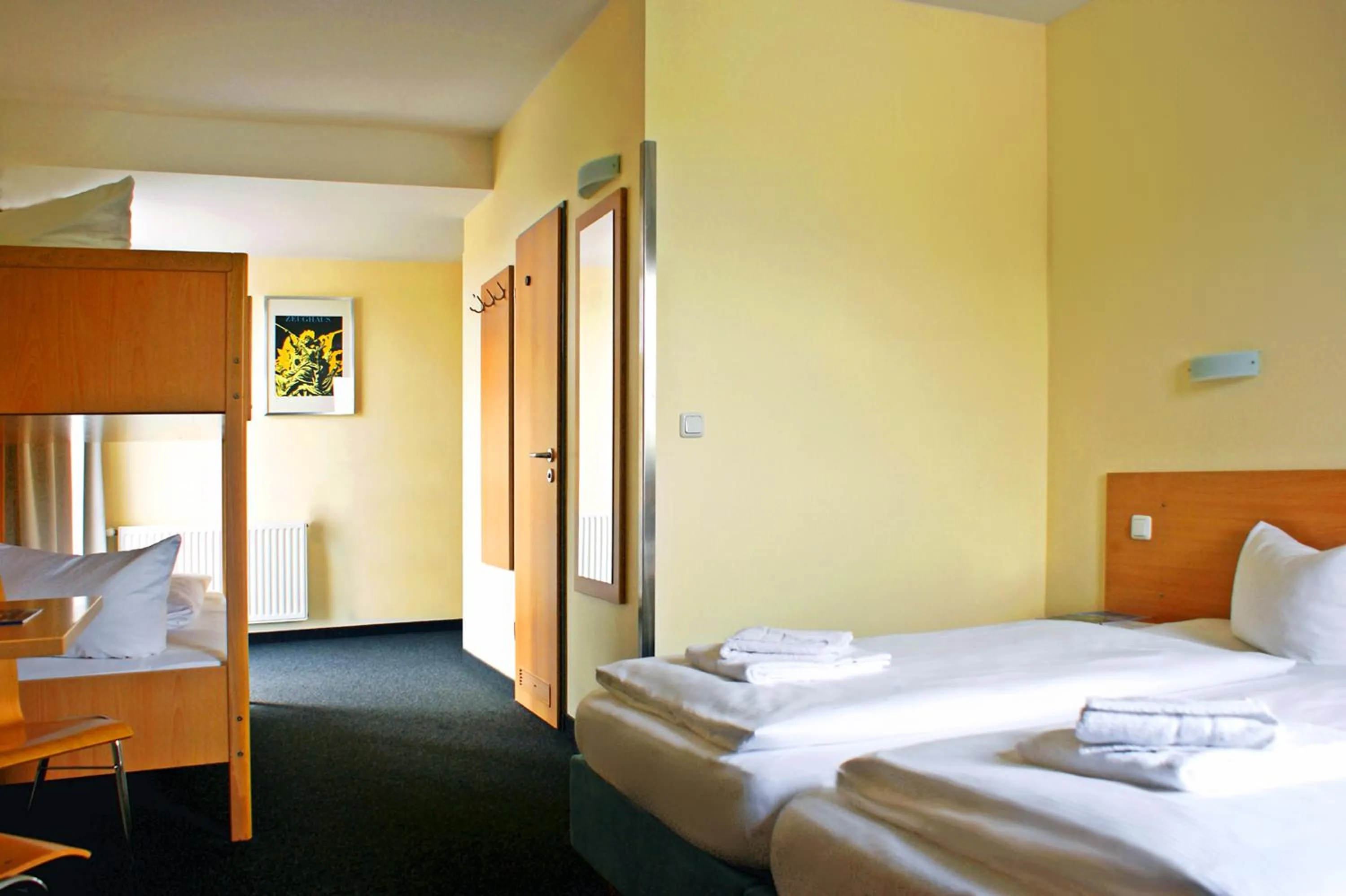 Photo of the whole room, Bed in Familienhotel Citylight