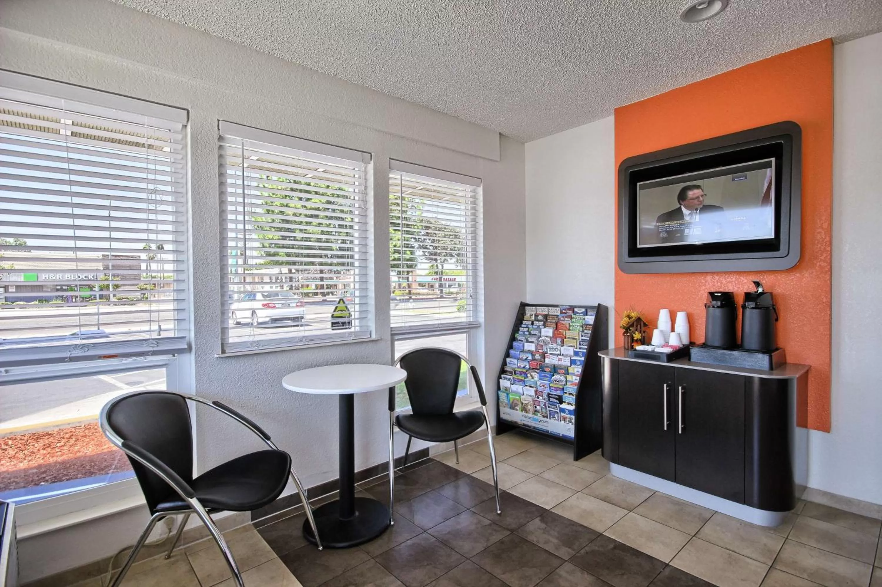 Communal lounge/ TV room in Motel 6-Fresno, CA - Blackstone South