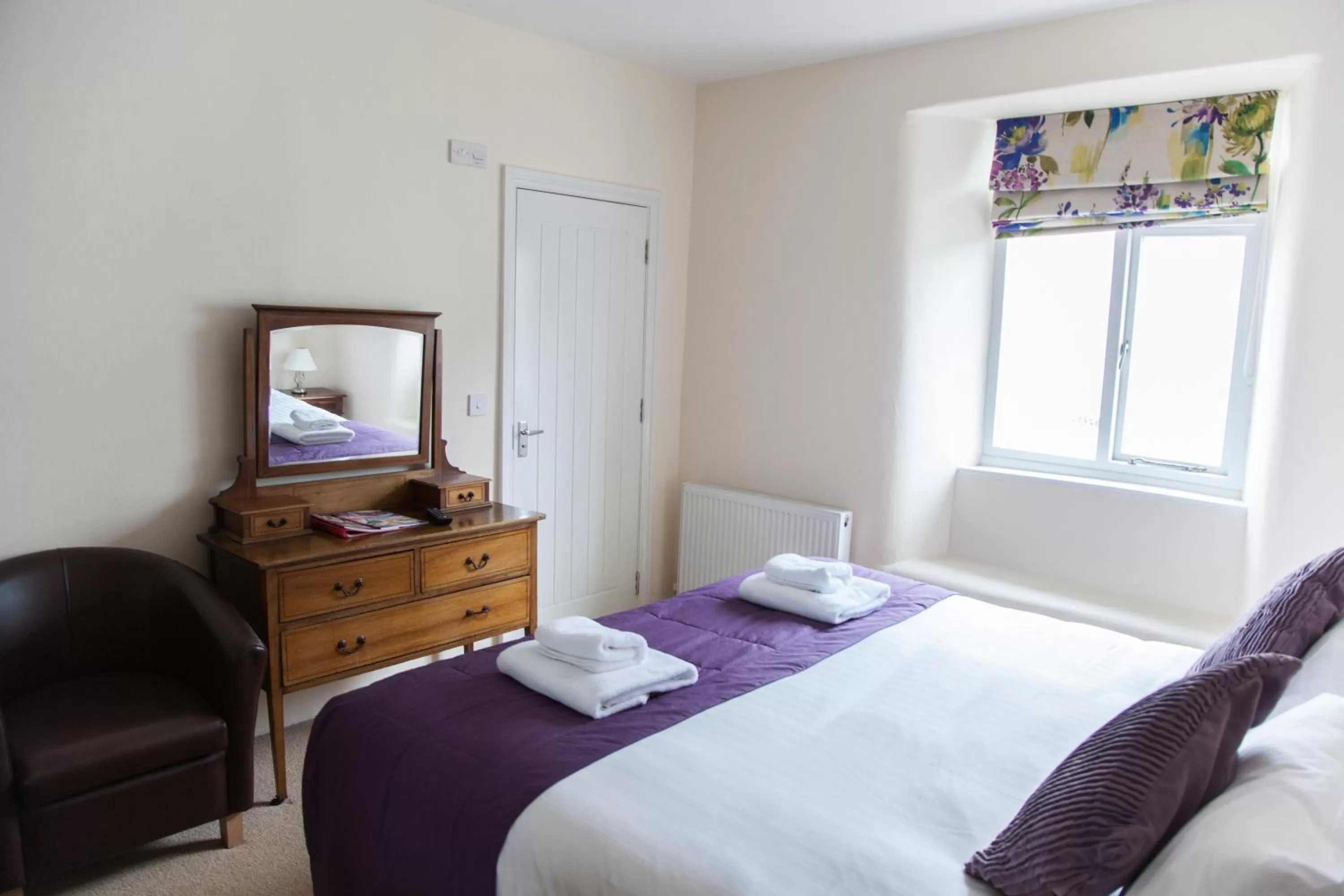 Bed in The Poltimore Inn