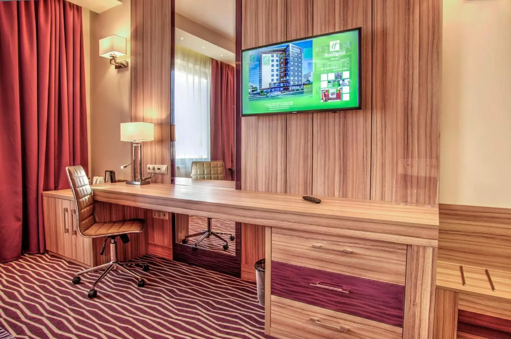 Photo of the whole room, TV/Entertainment Center in Holiday Inn Plovdiv, an IHG Hotel