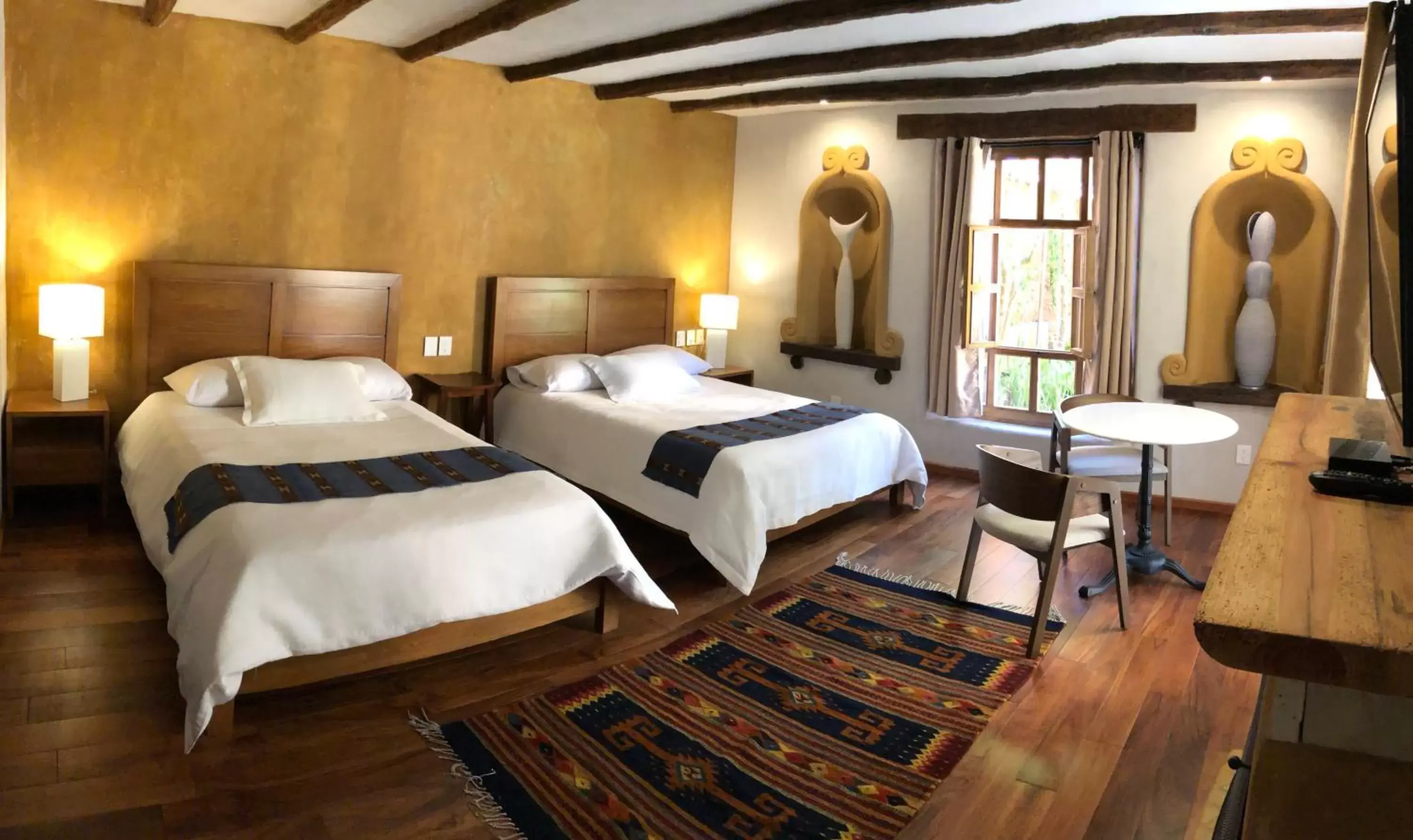 Photo of the whole room, Bed in Guayaba Inn Boutique Hotel