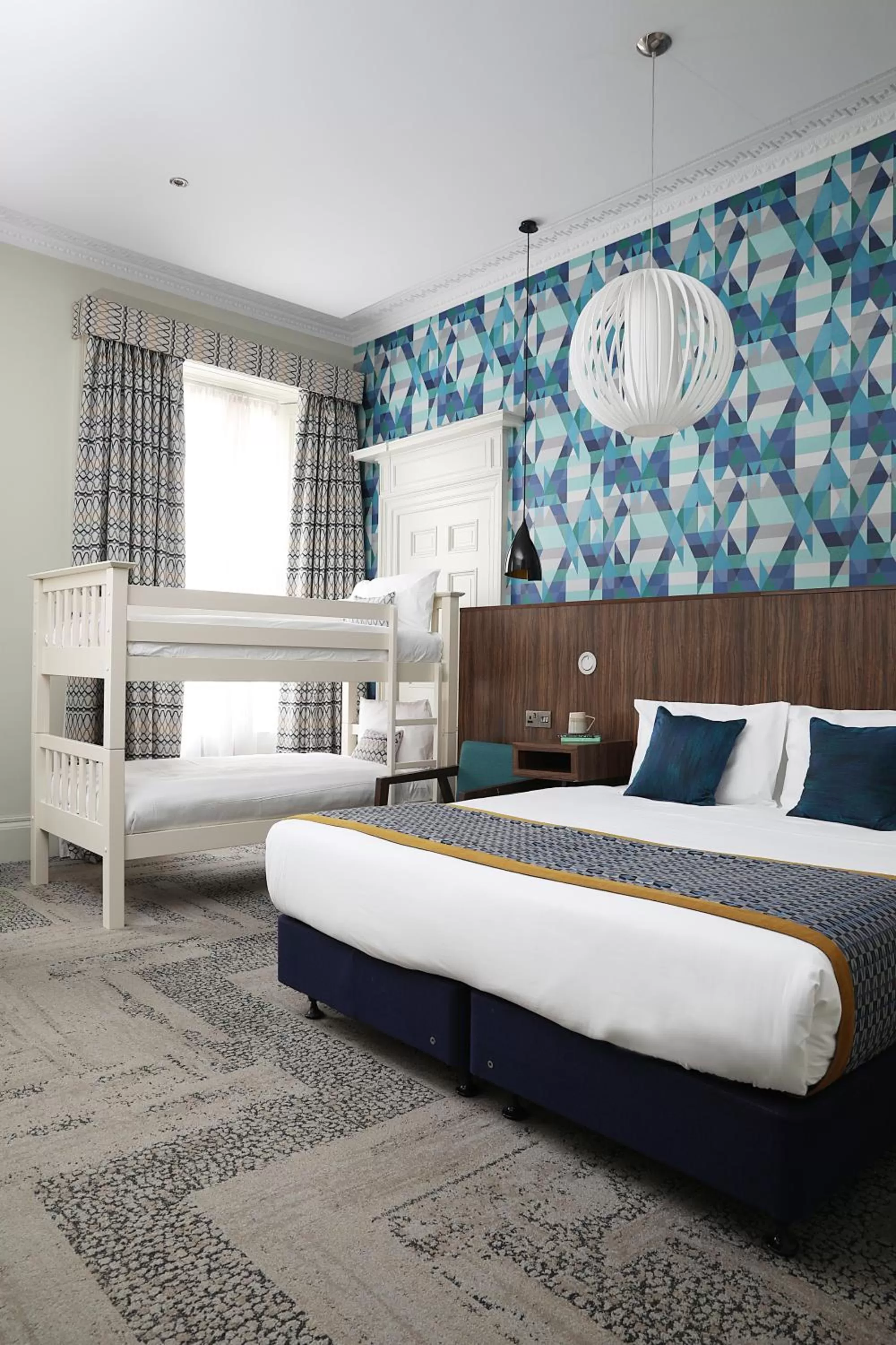 Bed in Cairn Hotel & Apartments