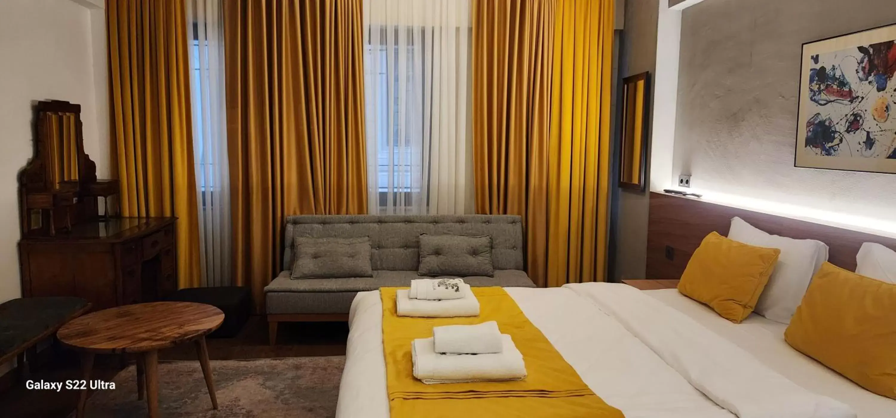 Bed in Aleksandr Pera Hotel