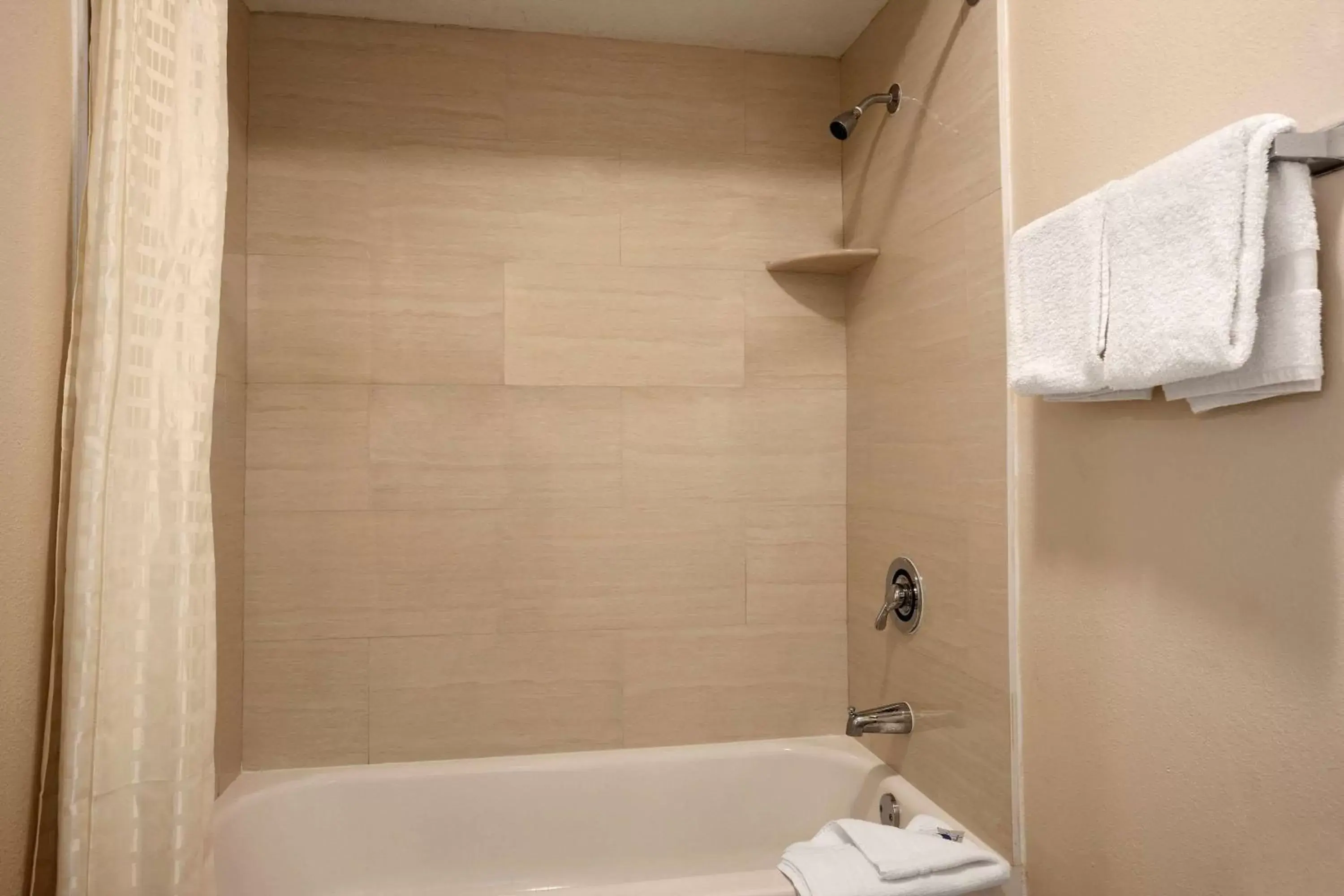 Bathroom in Super 8 by Wyndham Rahway/Newark