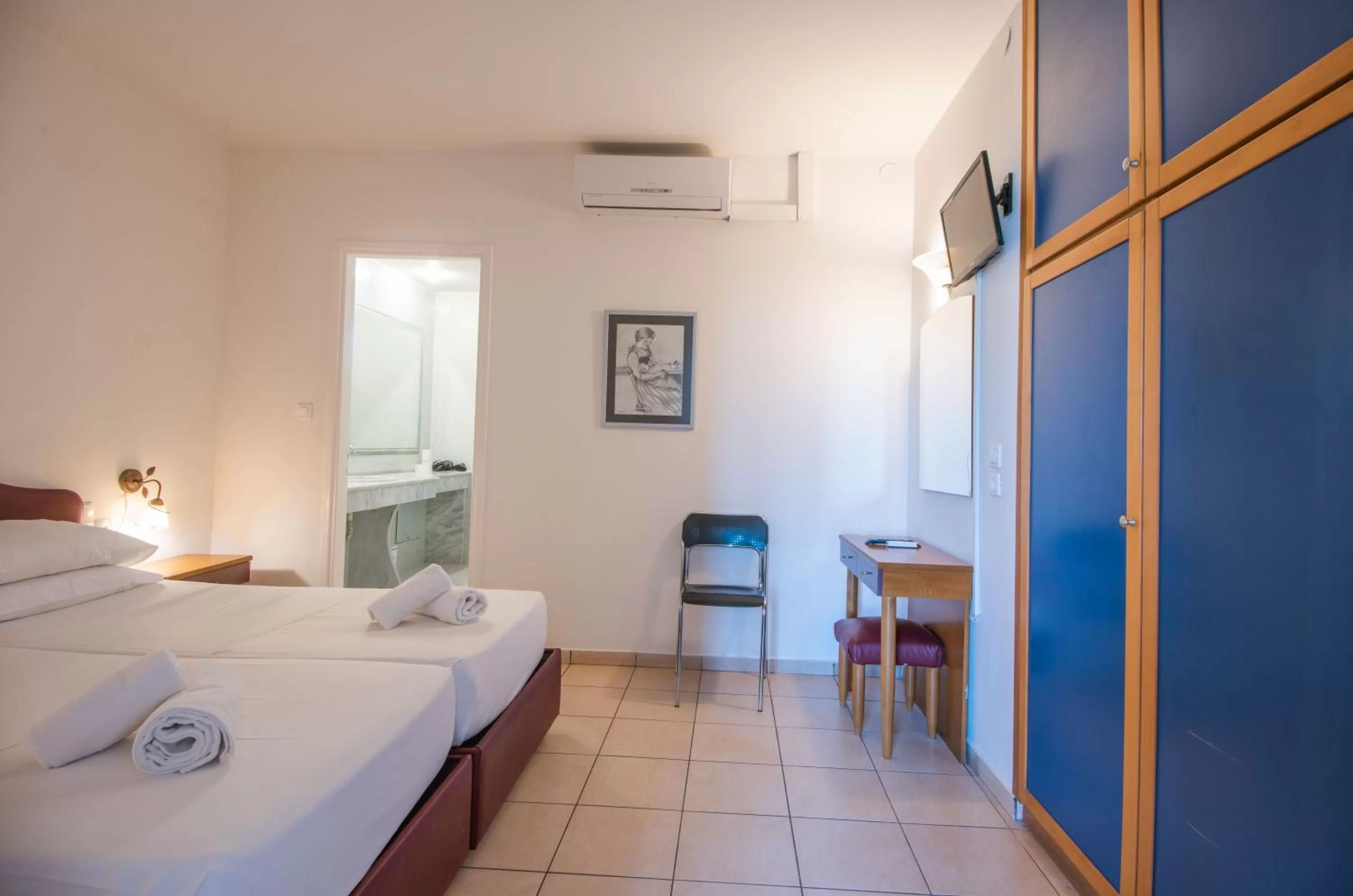 Bed in Polydoros Appartments