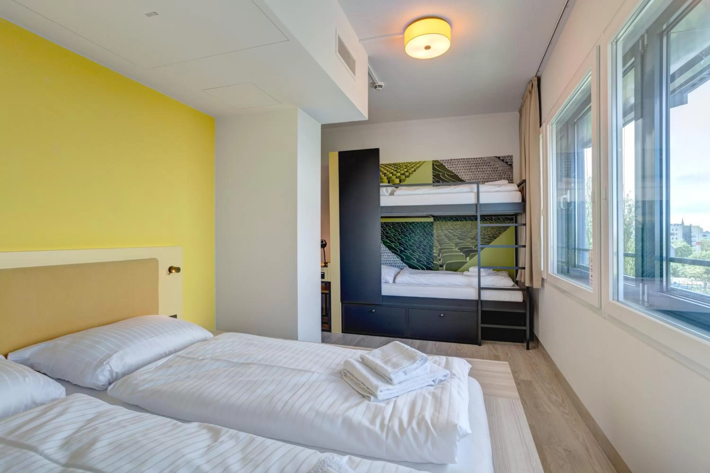 Photo of the whole room, Bed in MEININGER Hotel München Olympiapark