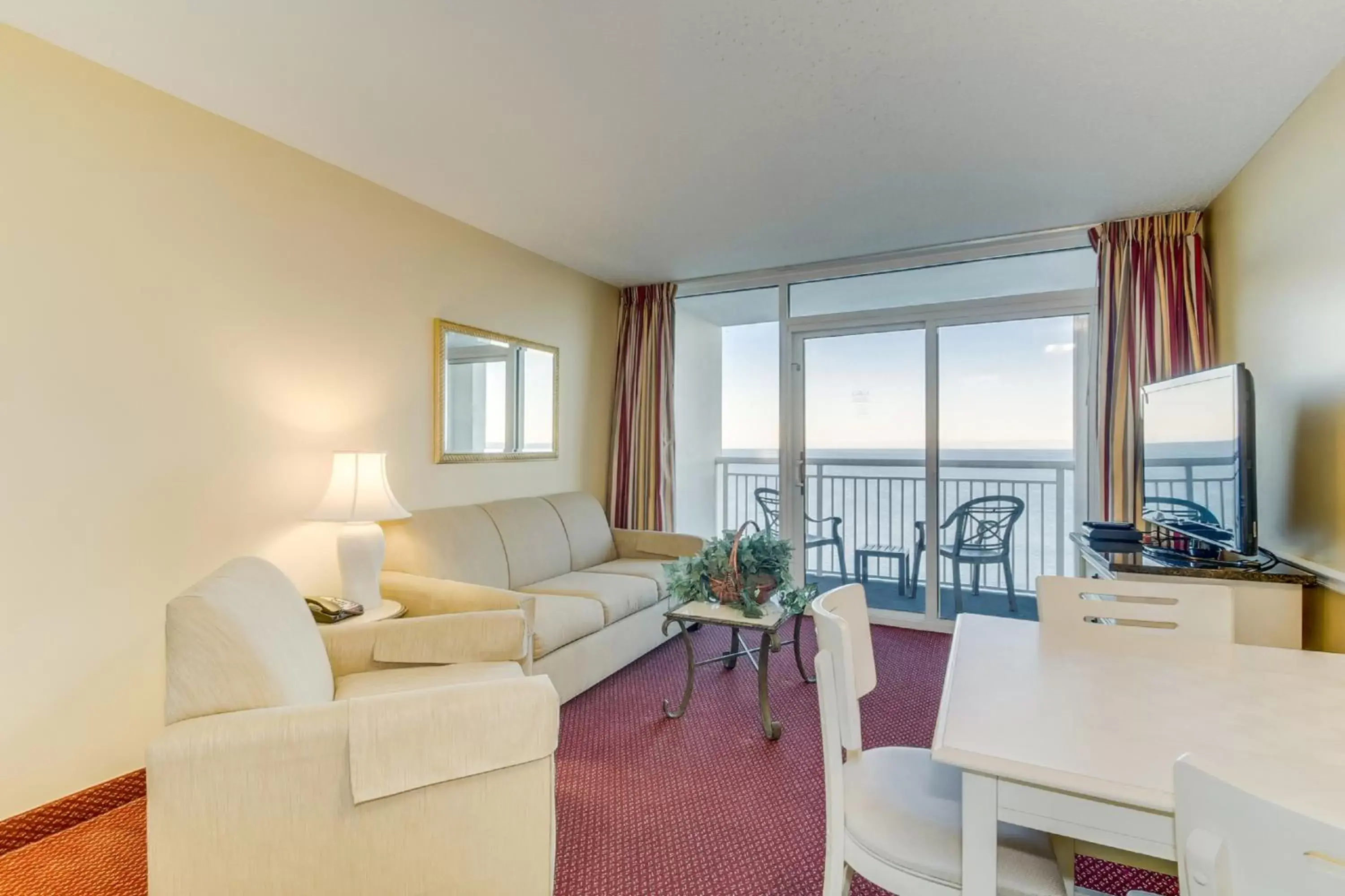 Living room, Seating Area in Oceanfront Condo Camelot By the Sea