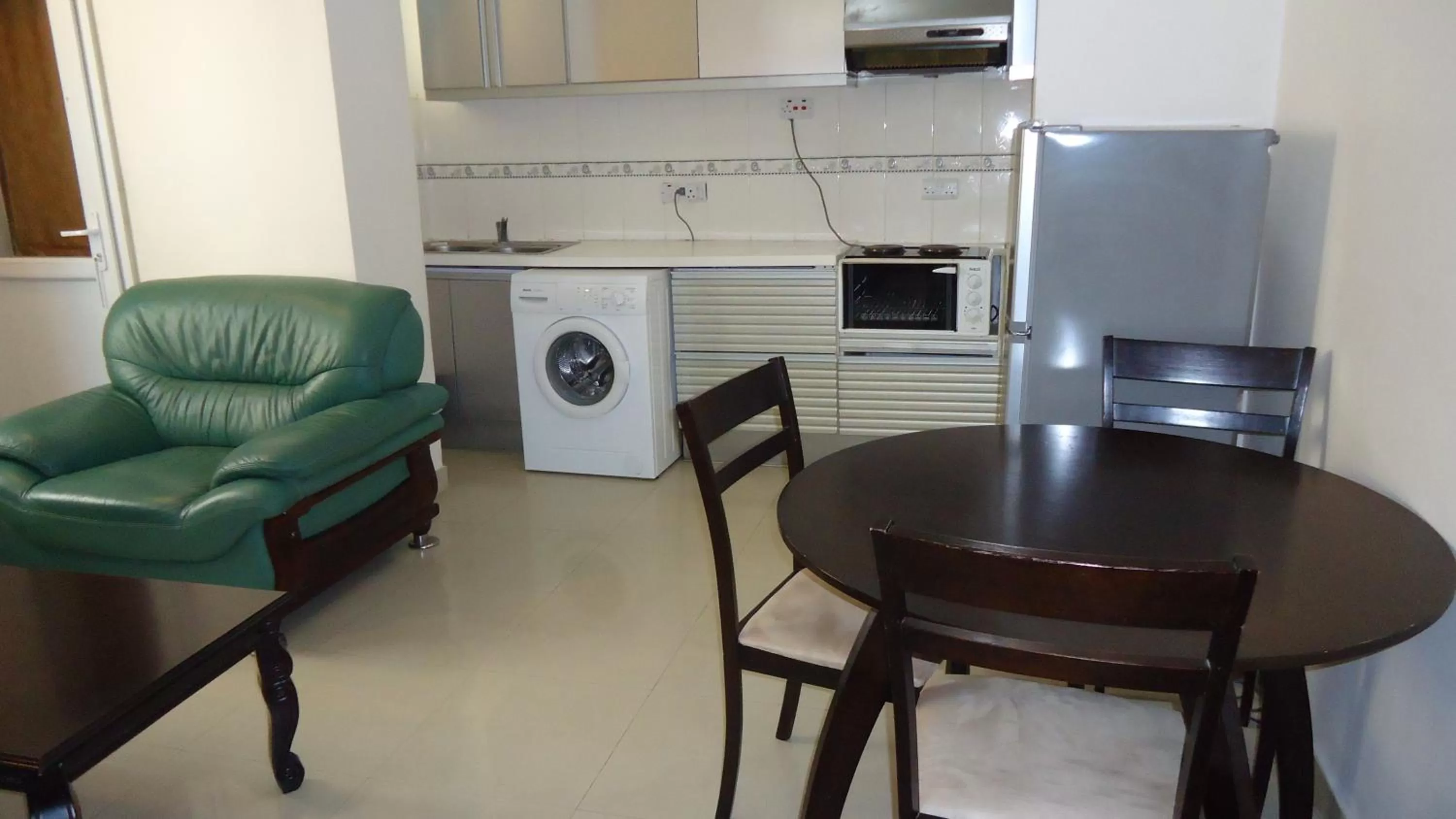 Kitchen or kitchenette in Rainbow Hotel