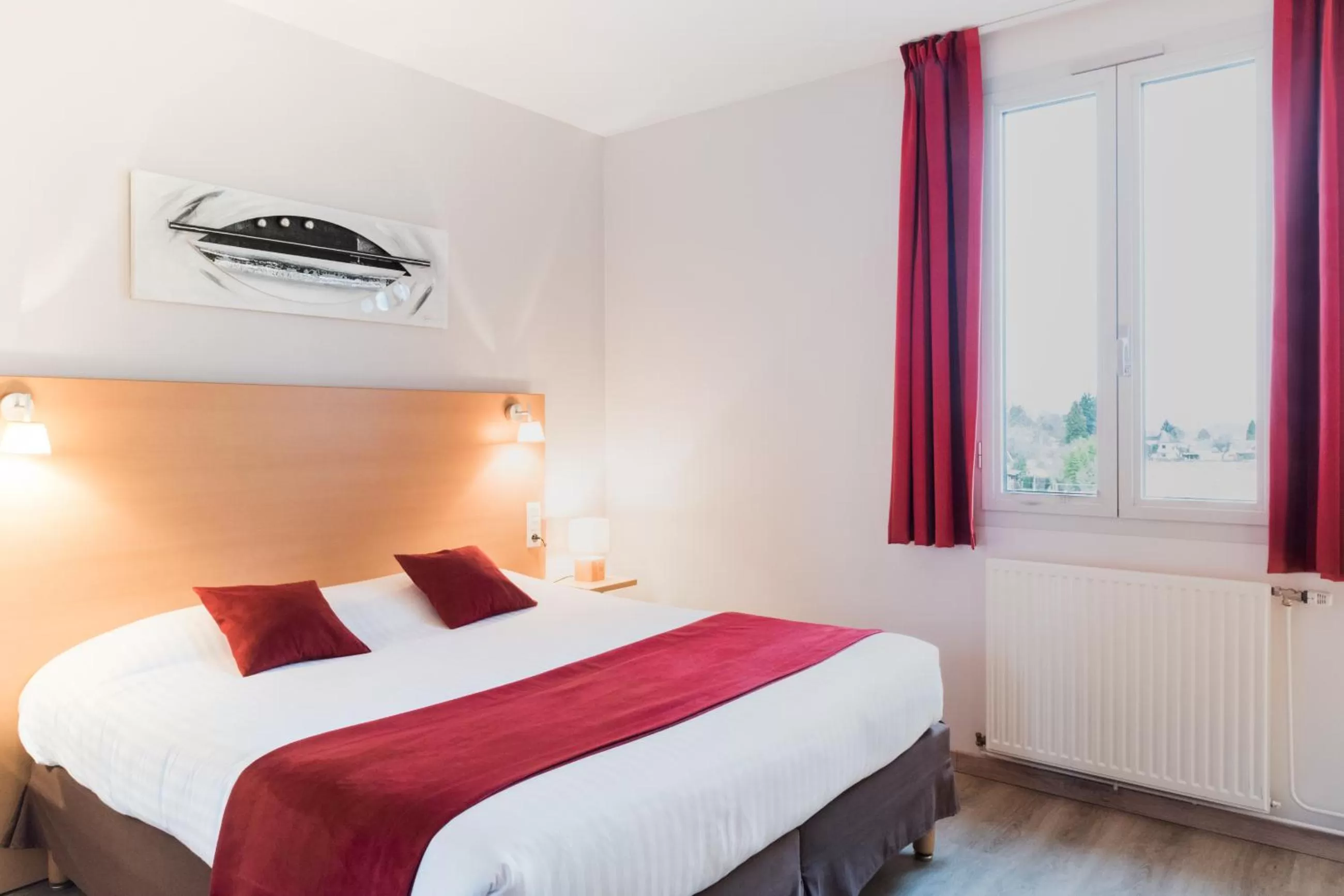 Bed in Carré Py' Hôtel