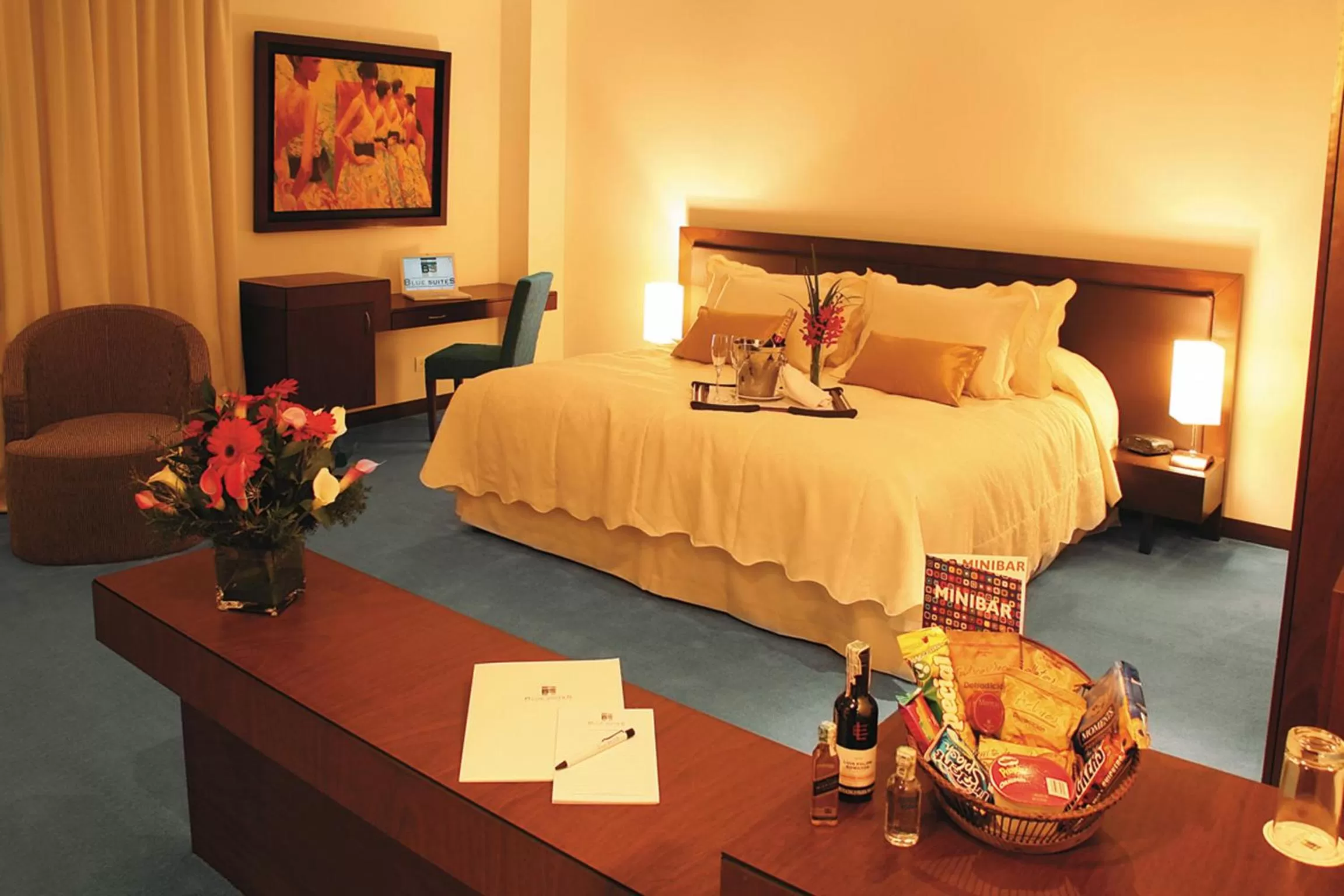 Bed in Blue Suites Hotel