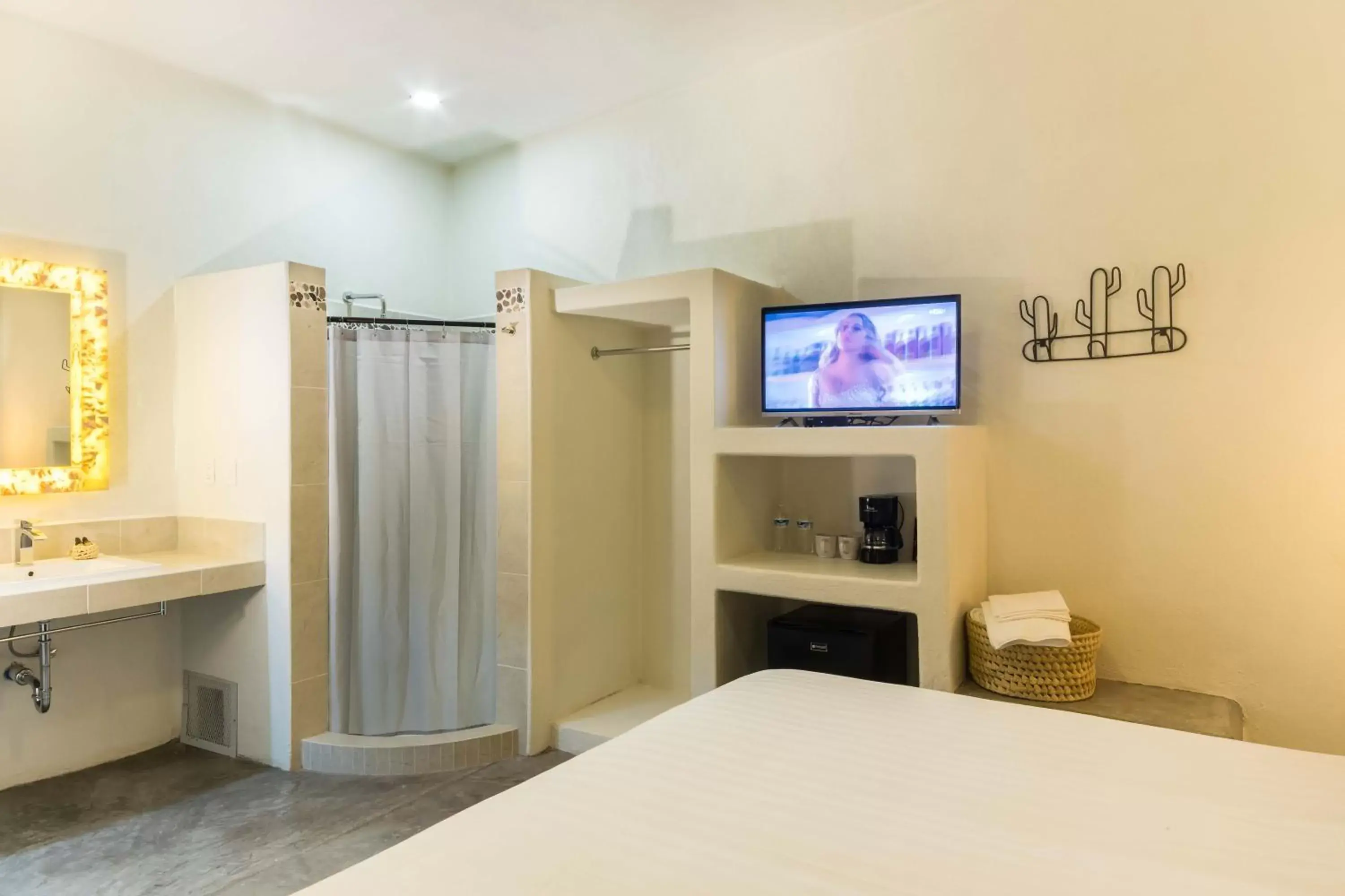 Bathroom, TV/Entertainment Center in Rosarito Hotel