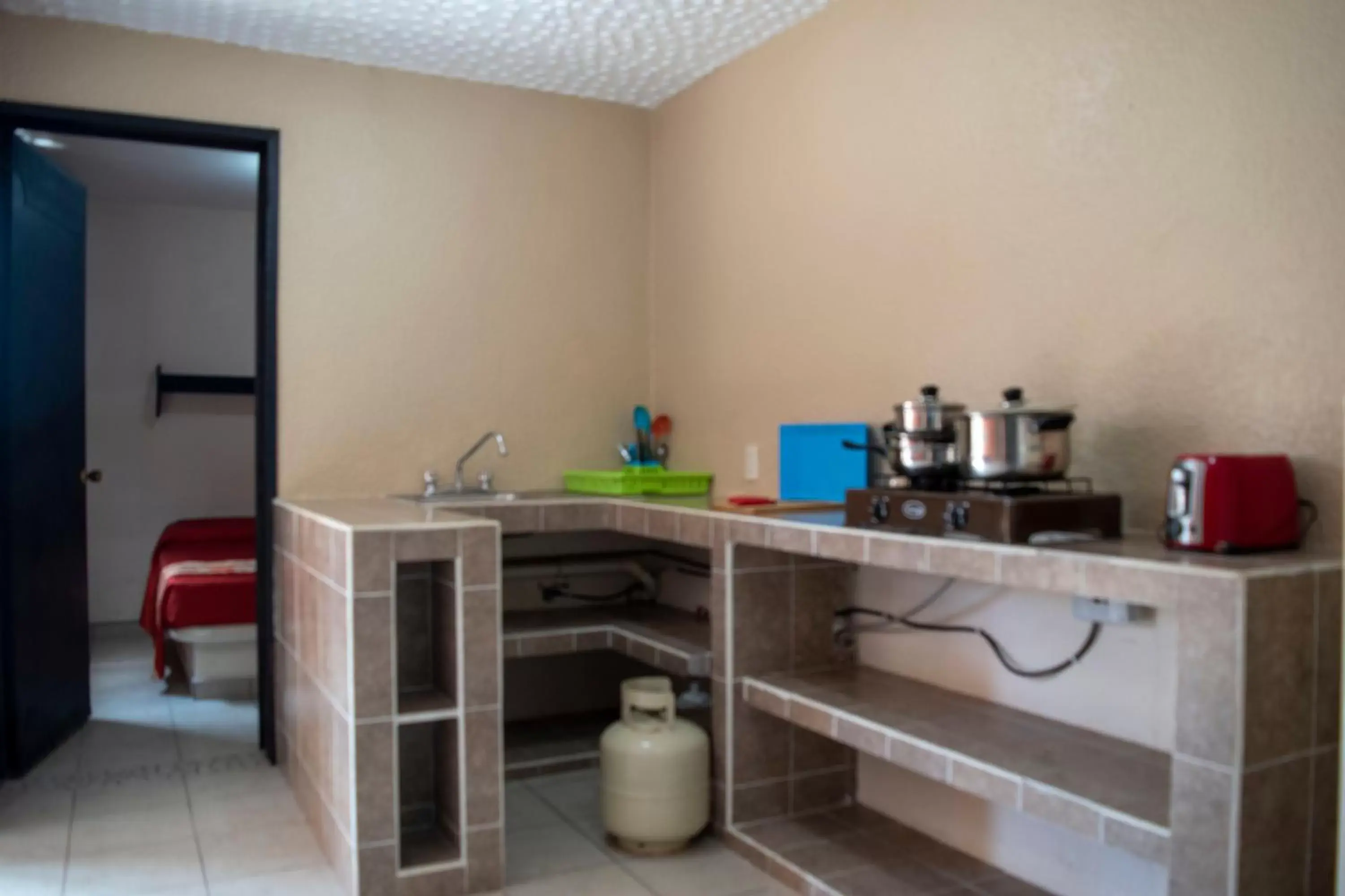 Kitchen/Kitchenette in Isabel Suites