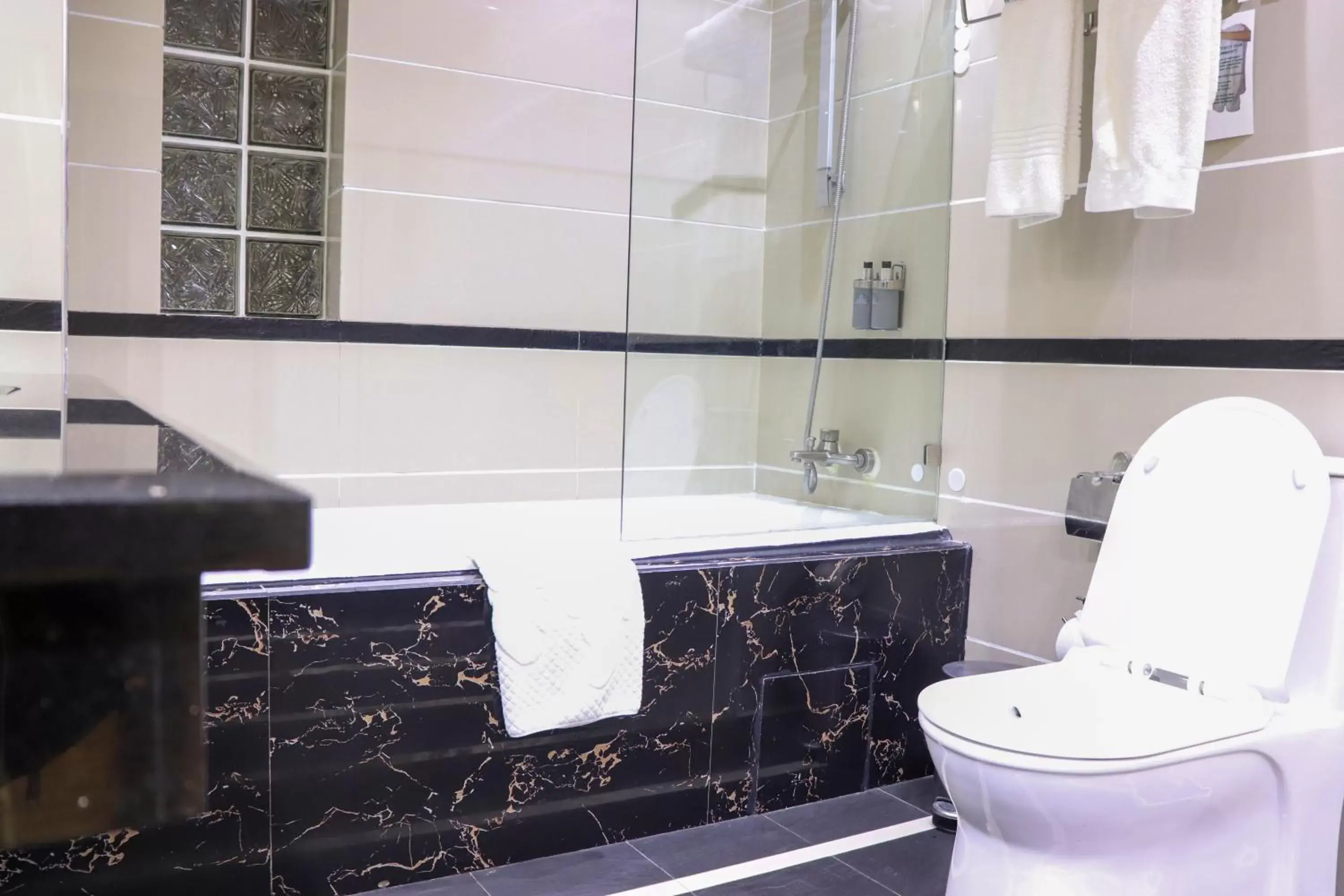 Toilet, Bathroom in Best Western Plus Lusaka Hotel
