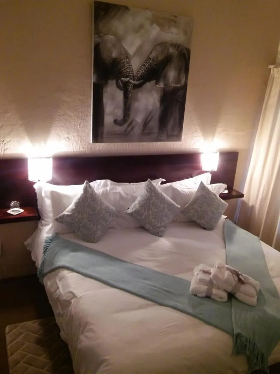 Bed in Point B Guest House -Sustainable Solar Energy