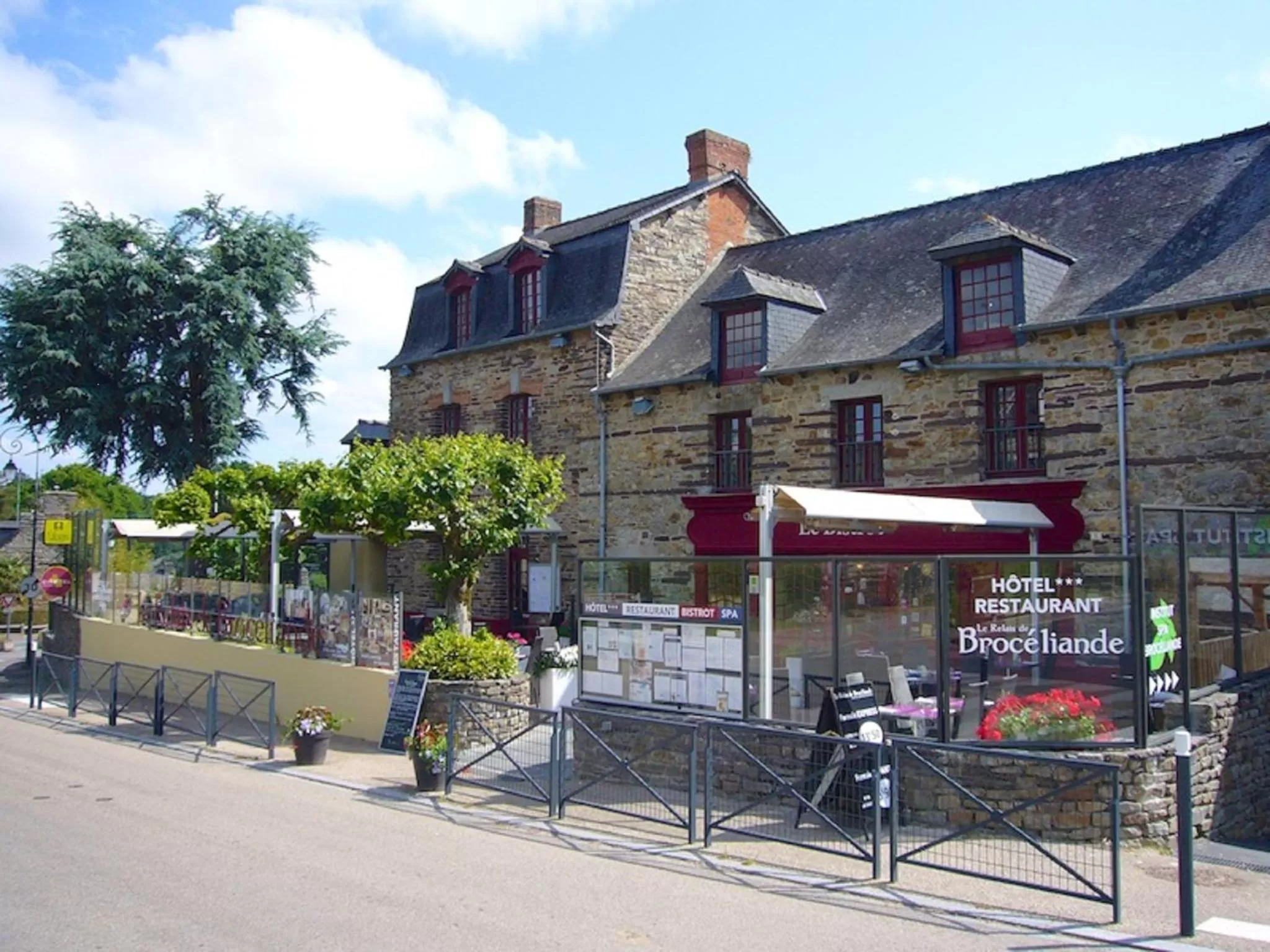 Property building in Logis Hotel, restaurant et spa Le Relais De Broceliande