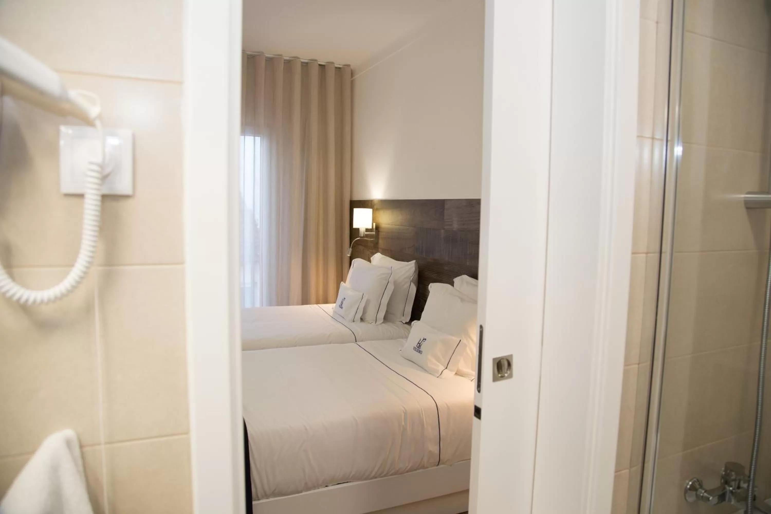 Bed in Hotel Veleiro