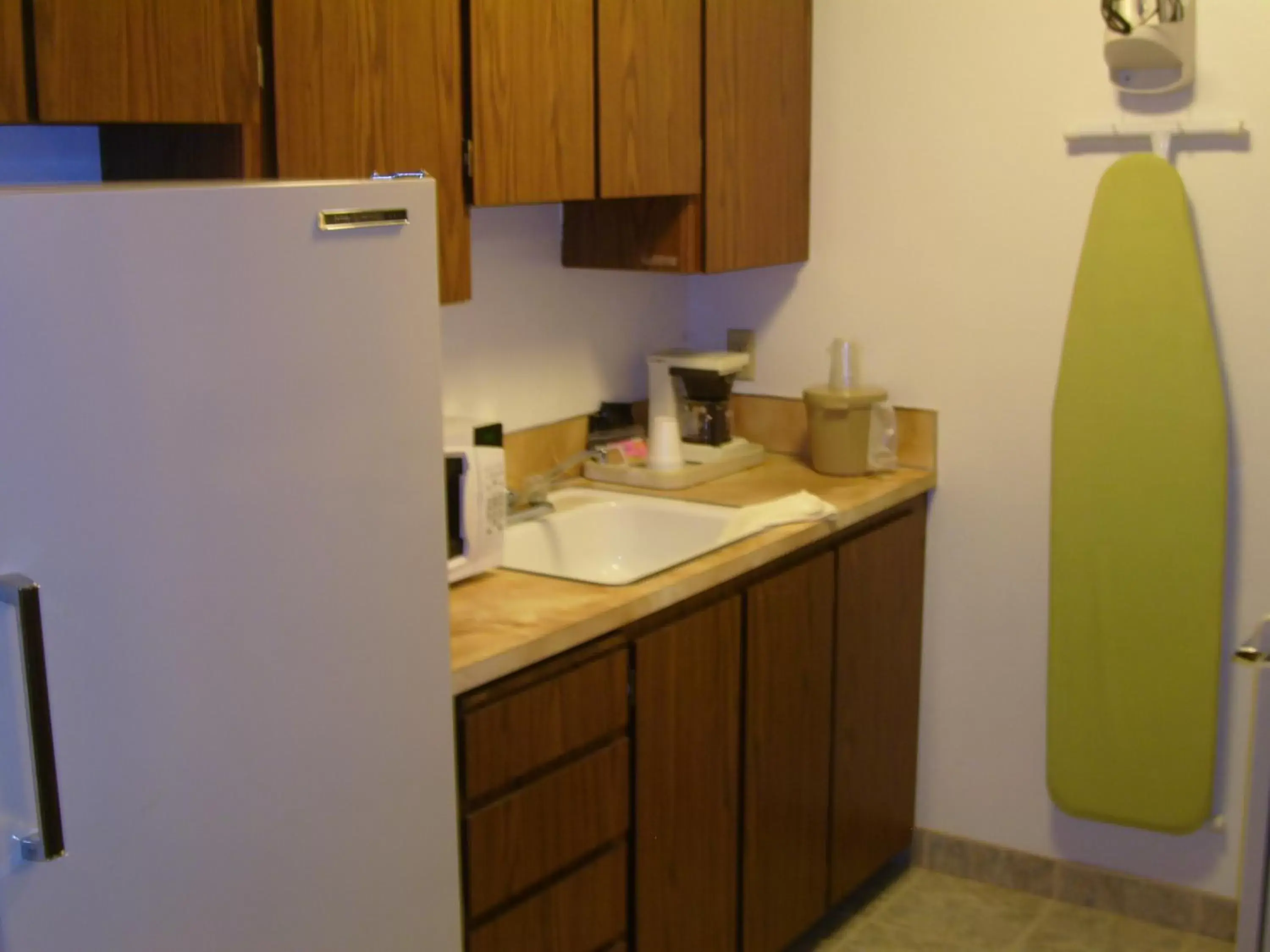 Kitchen or kitchenette, Kitchen/Kitchenette in Shanico Inn