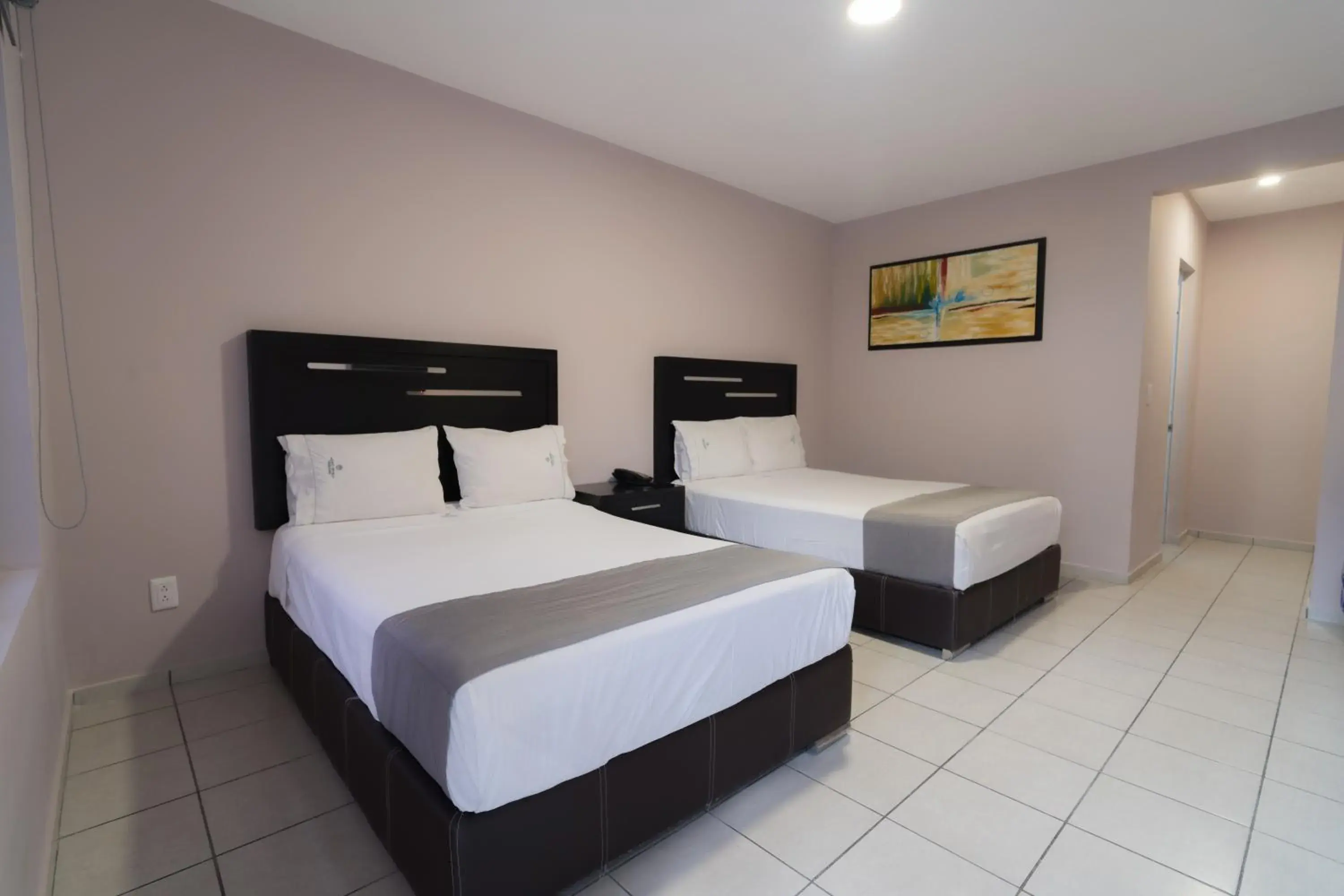Twin Room in Expo Hotel Guadalajara - Zona Expo frente al Centro de Convenciones Twin Room in Expo Hotel Guadalajara - Zona Expo frente al Centro de Convenciones