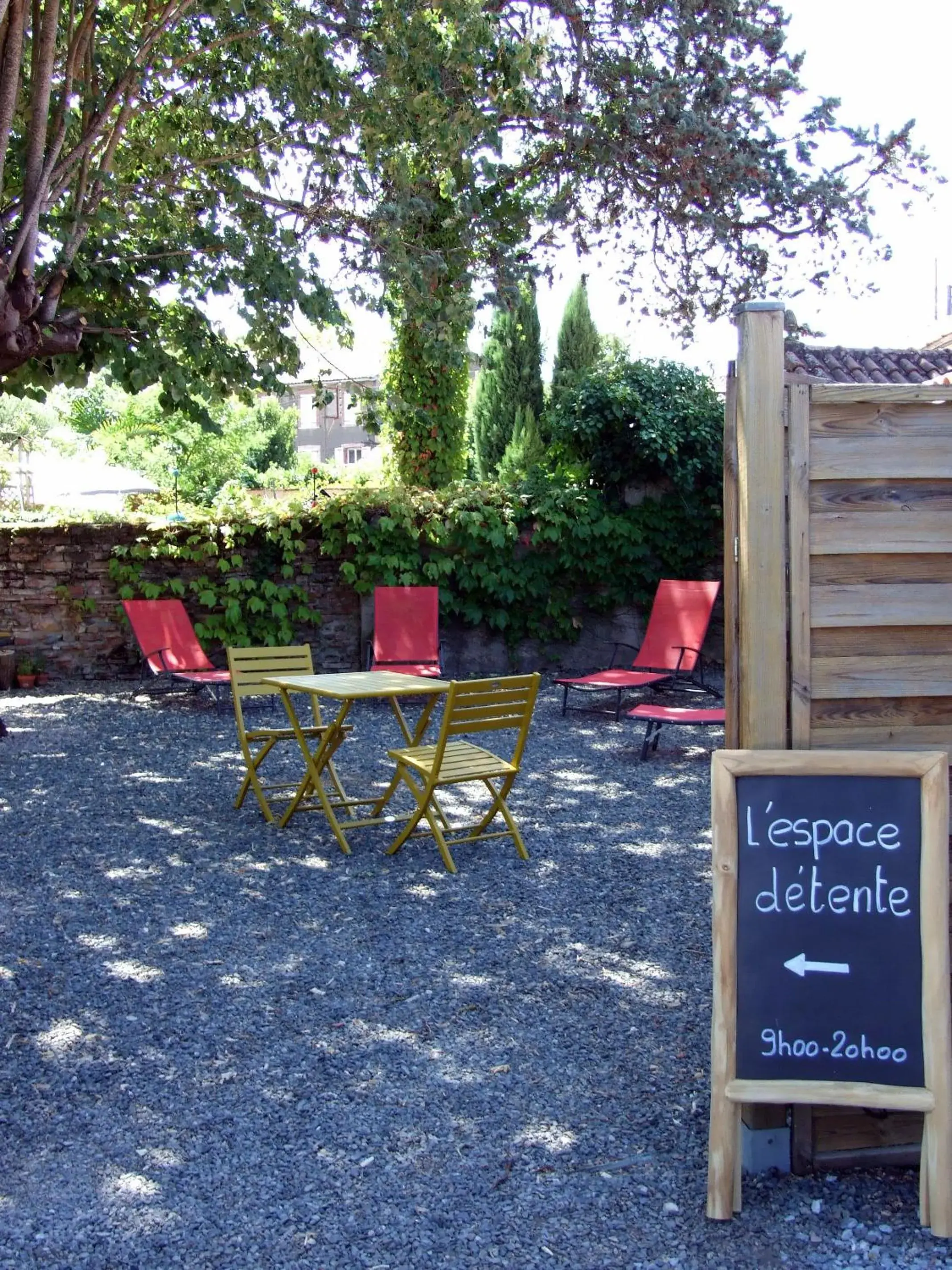 Patio in Logis Hotel L'Occitan