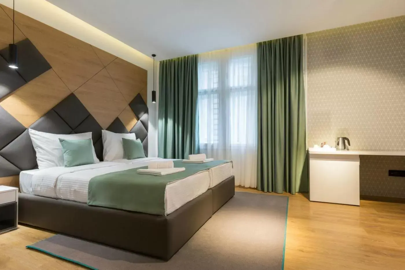 Bed in Capital Hotel Garni