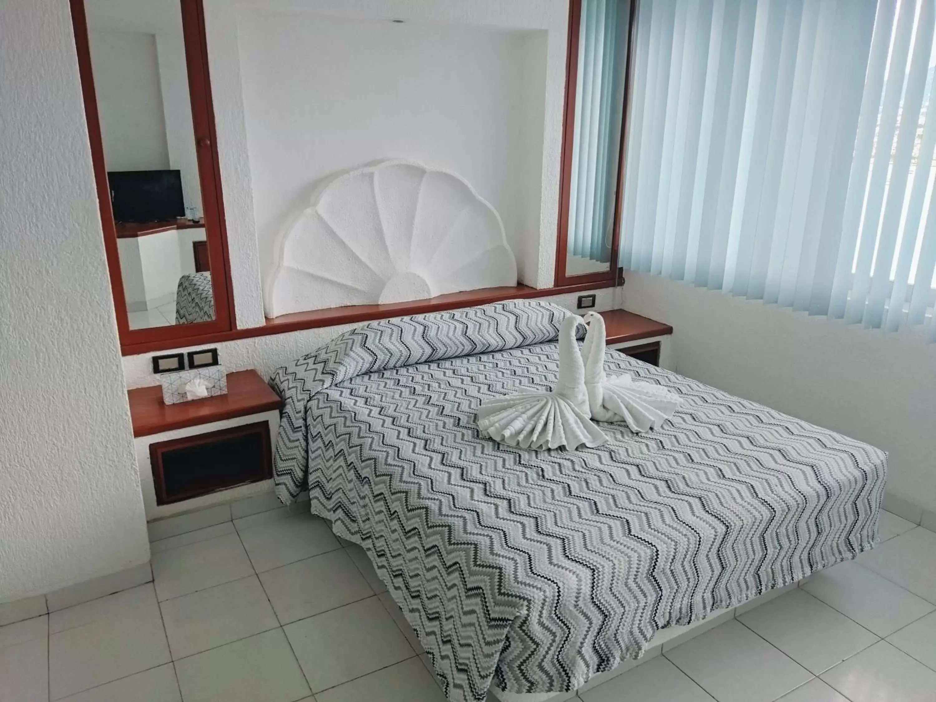 Bed in Hotel Aristos Acapulco