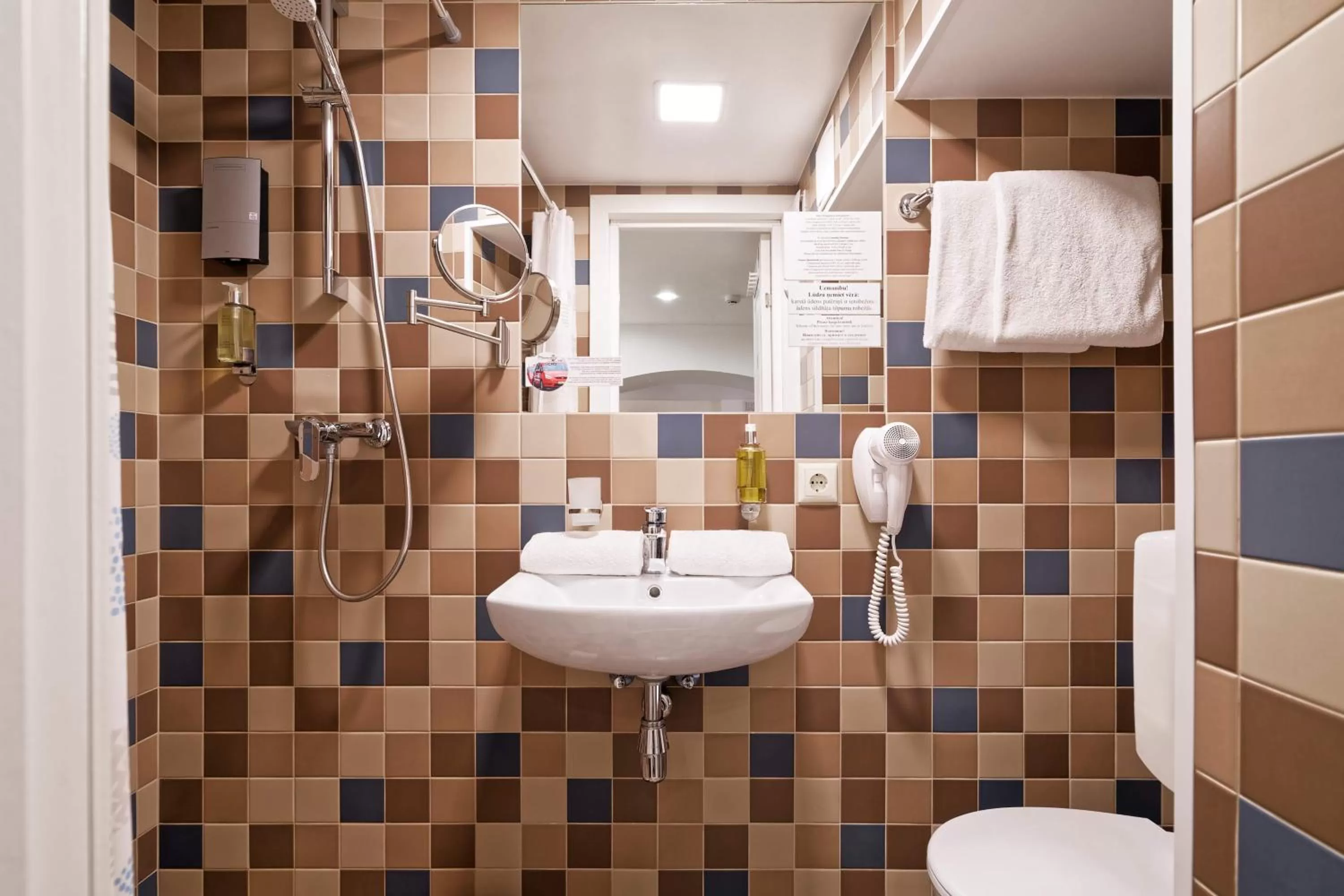 Shower in RIGAAPARTMENT SONADA Family Aparthotel - Private Parking