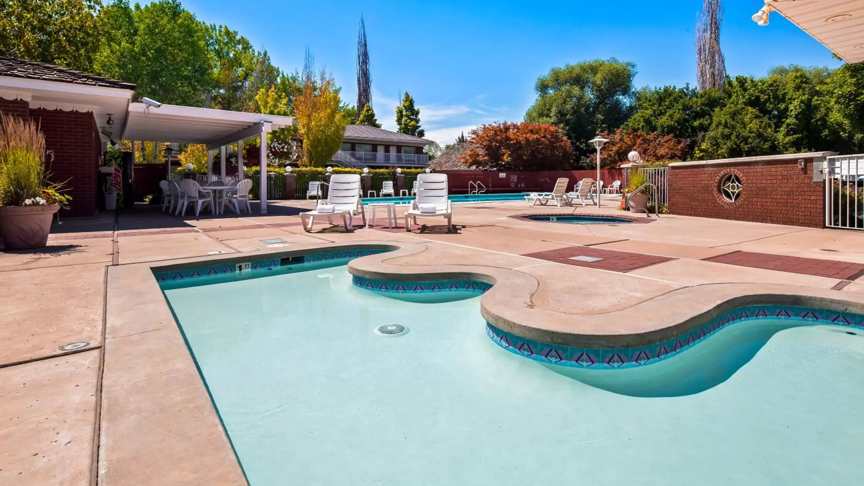 Swimming Pool in Baugh Motel, SureStay Collection by Best Western