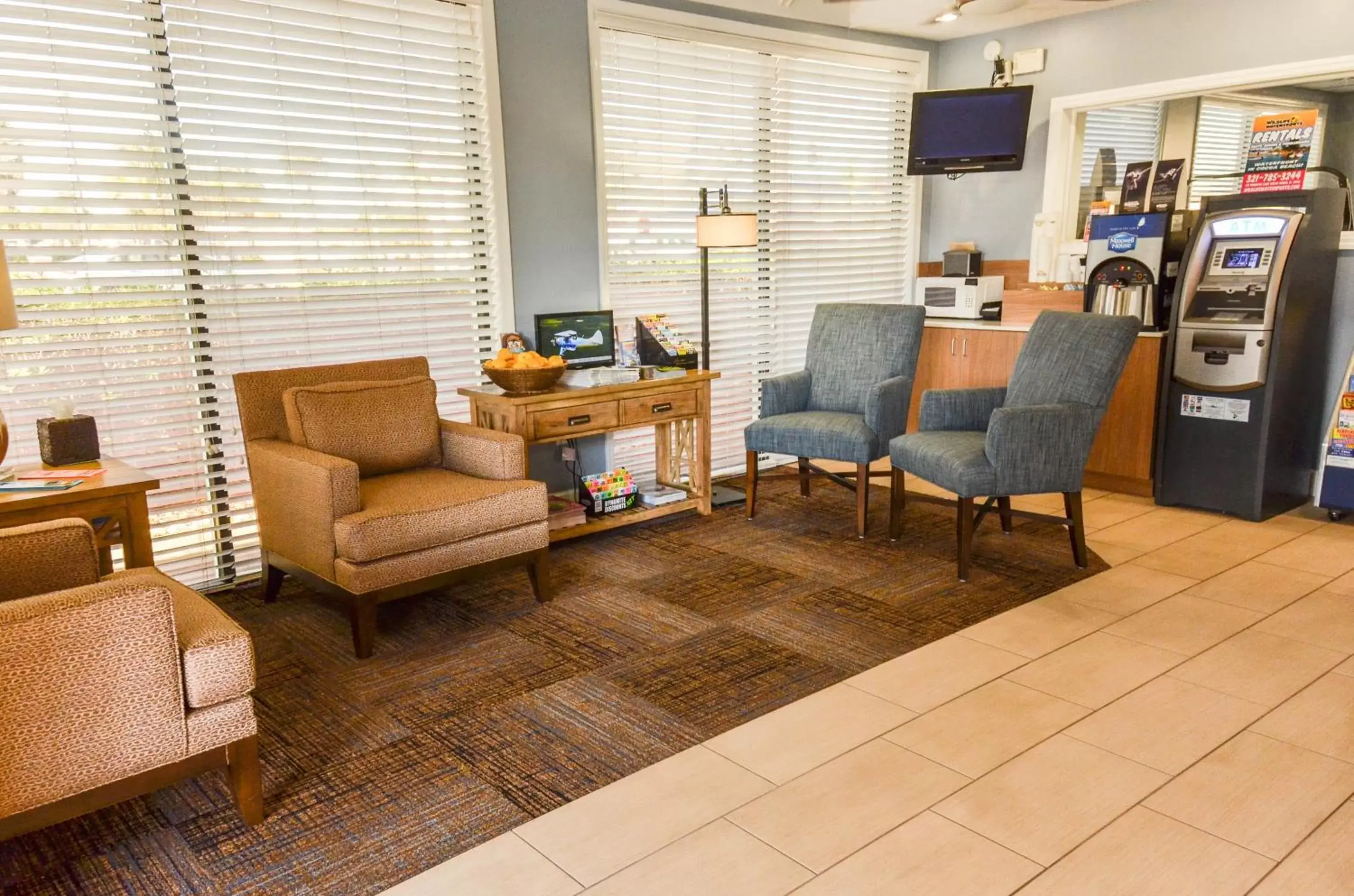Lobby or reception, Seating Area in Days Inn by Wyndham Cocoa Beach Port Canaveral