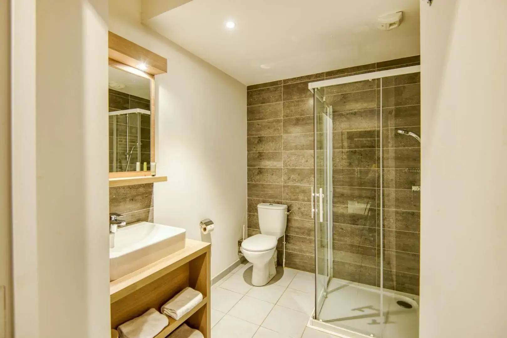 Shower, Bathroom in Aparthotel Adagio Access Saint Nazaire