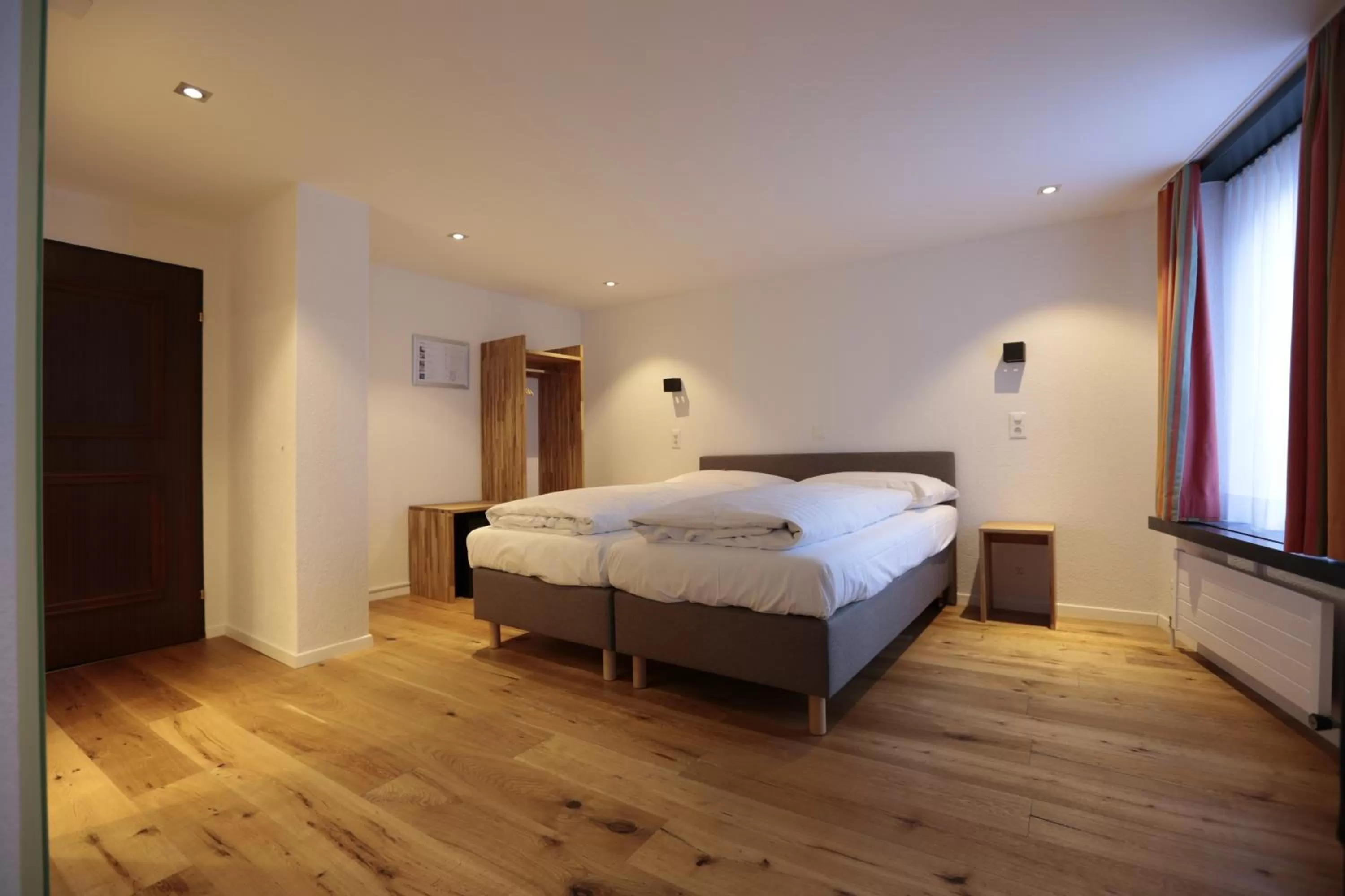 Photo of the whole room, Bed in HotelChur.ch