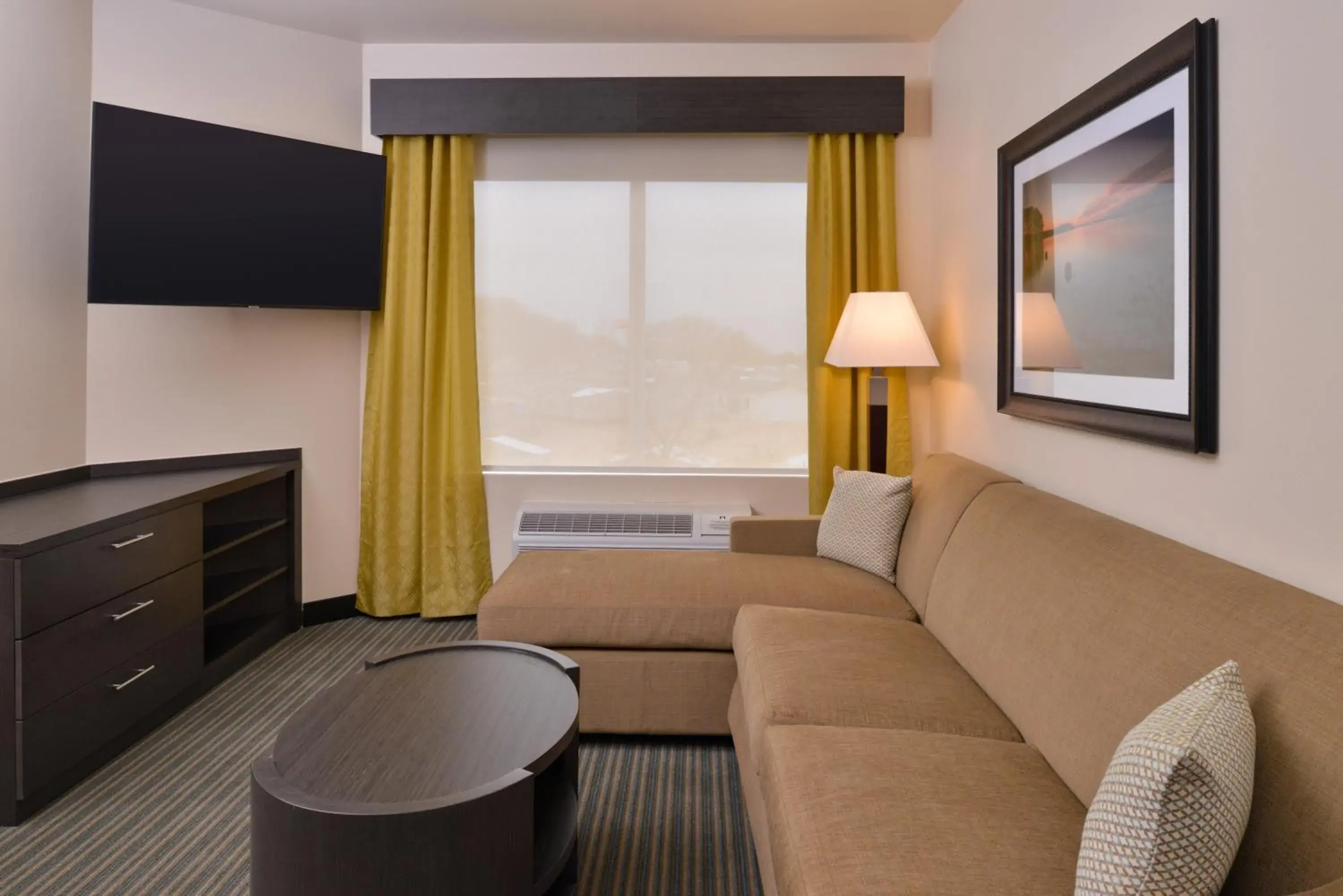 Bedroom, Seating Area in Candlewood Suites - Austin Airport, an IHG Hotel