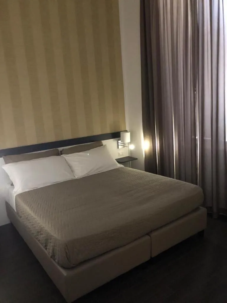 Bed in Hotel Cimarosa