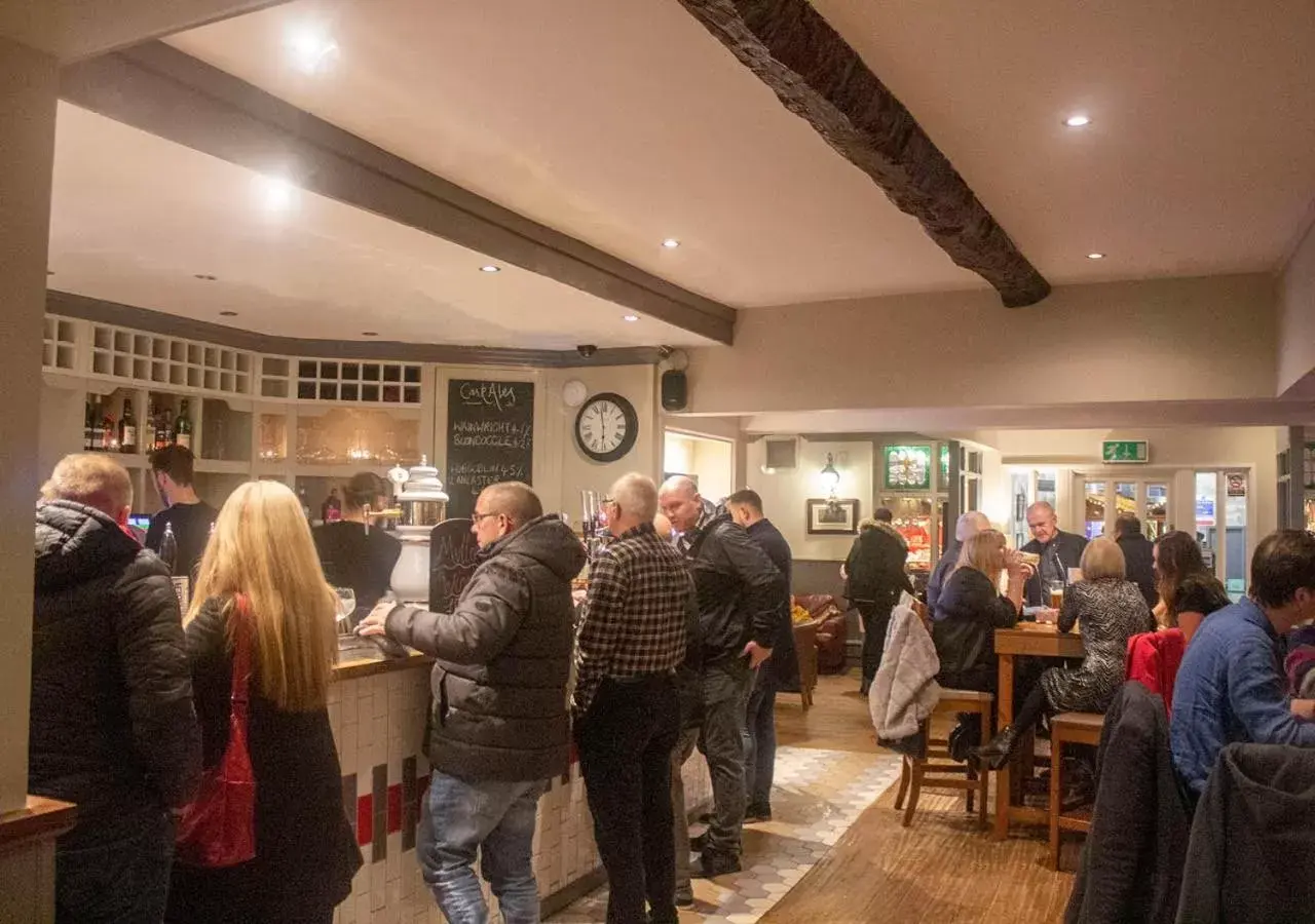 Lounge or bar, Guests in The Coach House Inn