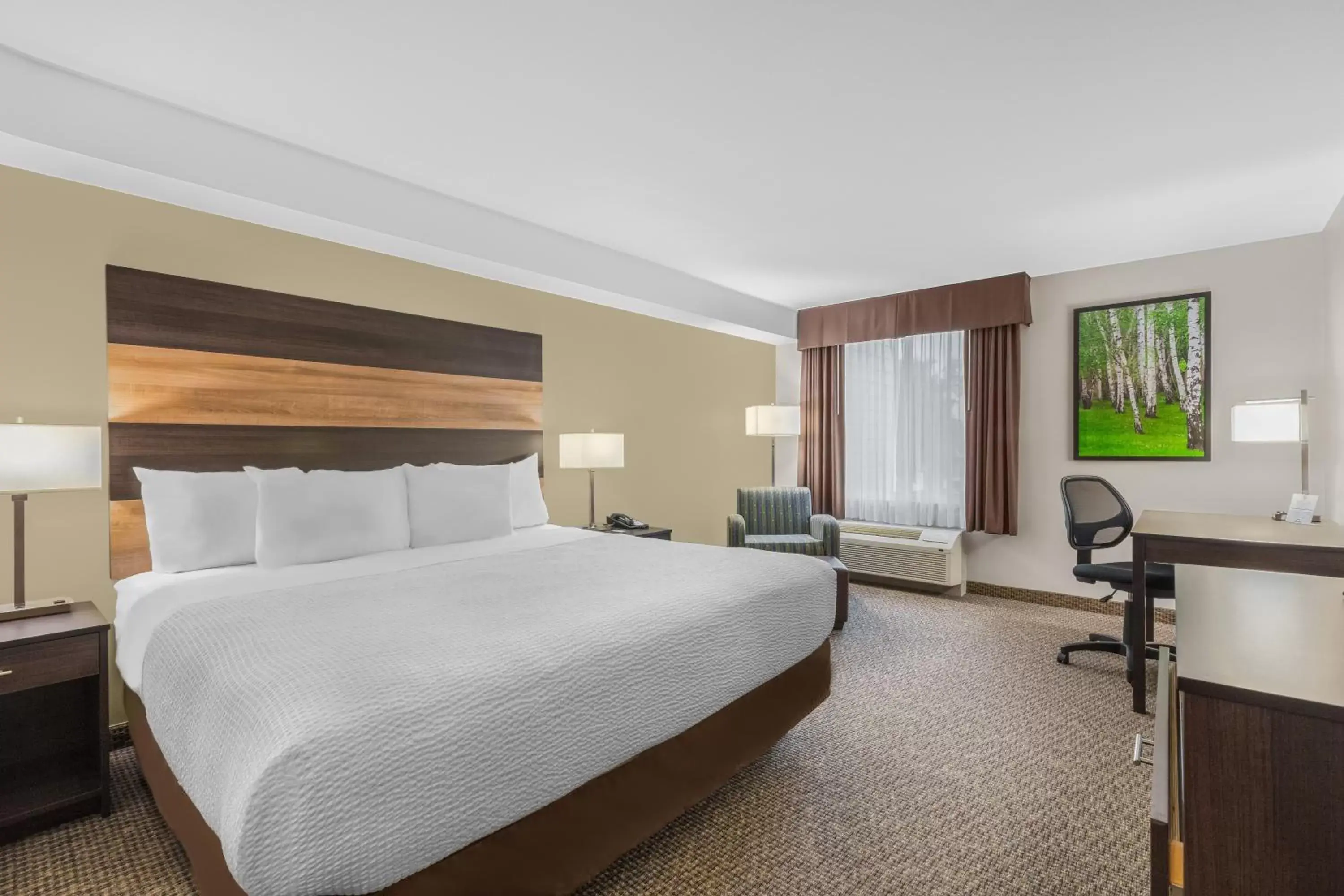 Bed in Days Inn & Suites by Wyndham Lindsay